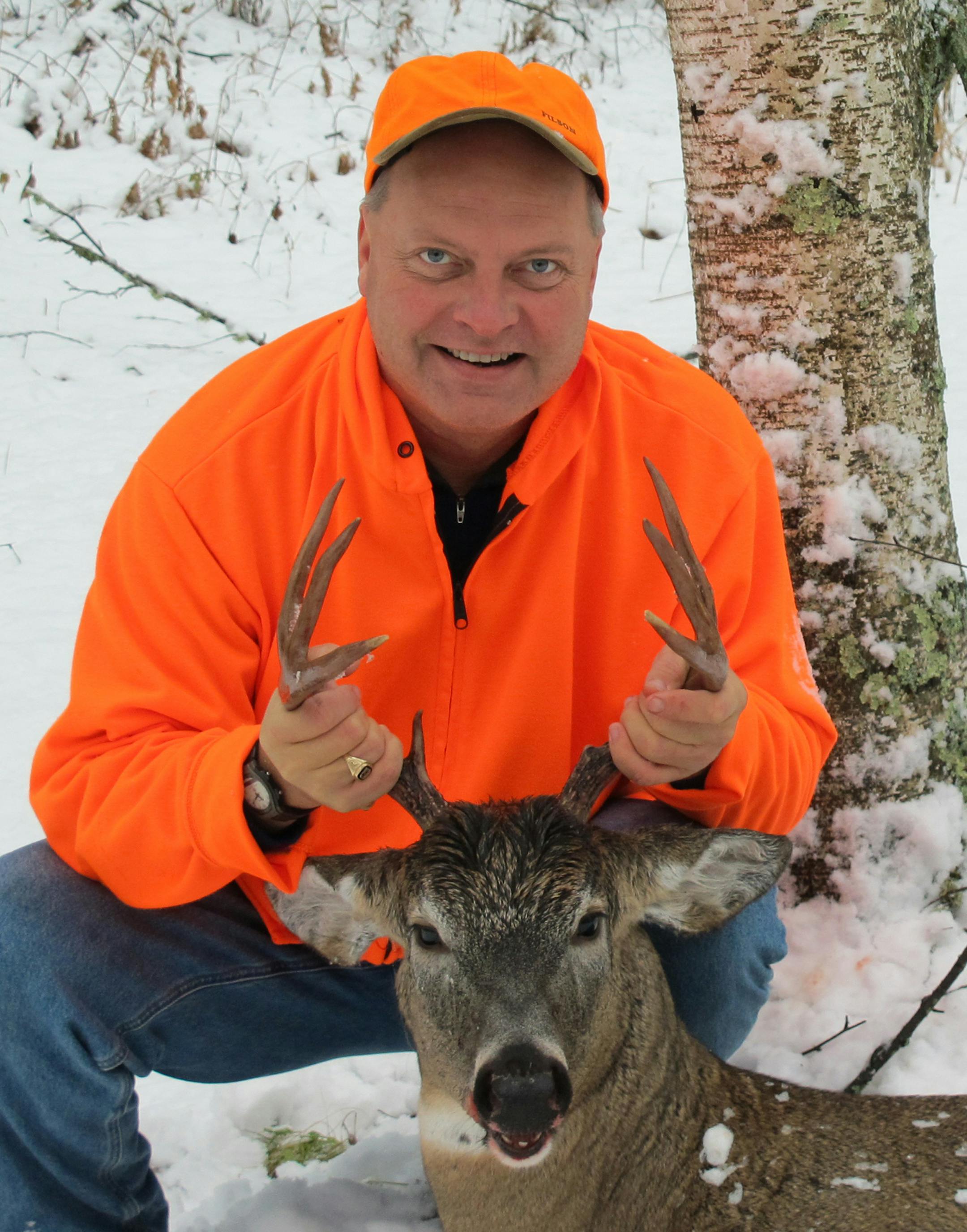 Craig Engwall, new executive director of the Minnesota Deer Hunters Association, with a deer he bagged in 2013. Photo courtsey Craig Engwall