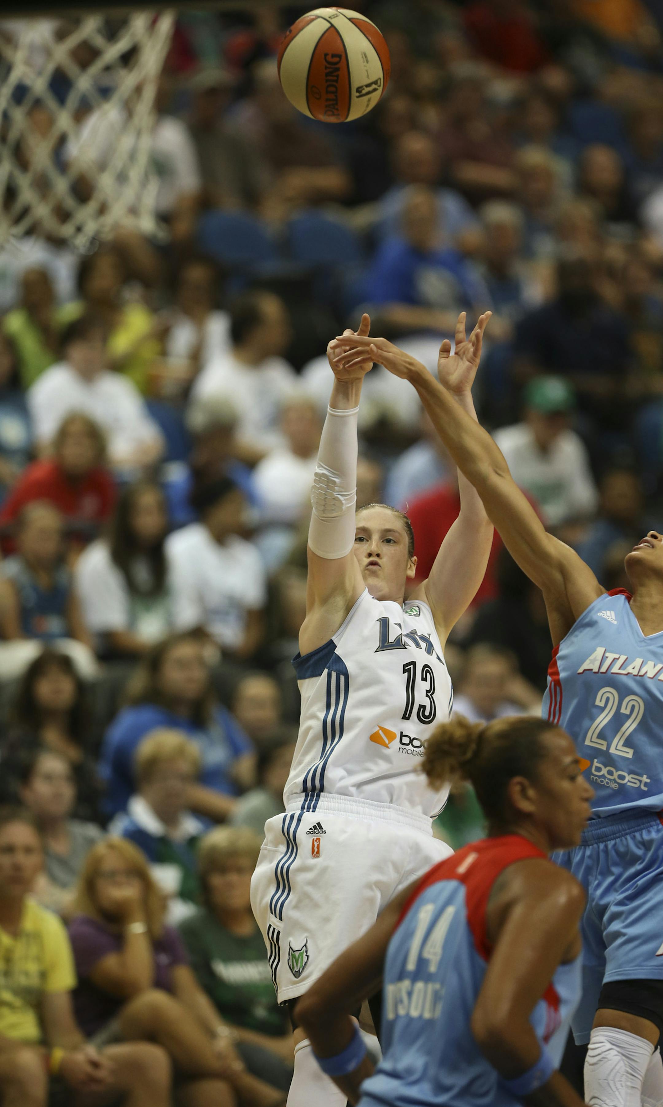 The Minnesota Lynx met the Atlanta Dream in an WNBA game Tuesday night, July 9, 2013 at Target Center in Minneapolis, Minn. The Lynx' Lindsay Whalen got off a first quarter shot under pressure from the Dream's Armintie Herrington. ] JEFF WHEELER ‚Ä¢ jeff.wheeler@startribune.com