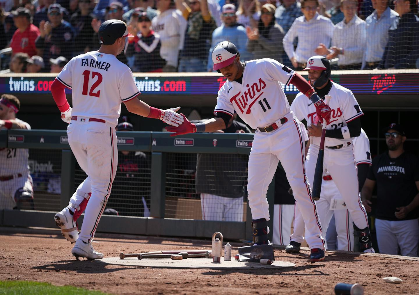 Minnesota Twins shortstop Kyle Farmer (12) celebrates at home with Minnesota Twins designated hitter Jorge Polanco (11) after hitting a home run in the third inning. The Minnesota Twins hosted the Tampa Bay Rays at Target Field on Wednesday, Sept. 13, 2023 in Minneapolis, Minn. ] RENEE JONES SCHNEIDER • renee.jones@startribune.com