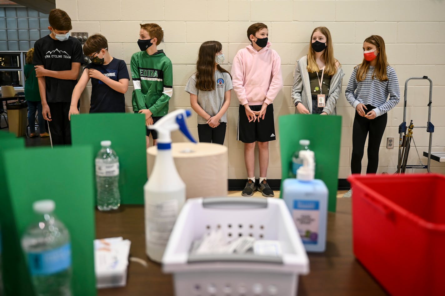 A group of South View Middle School students waited nervously for the first dose of the Pfizer BioNTech COVID-19 vaccine Friday afternoon in the school gymnasium.