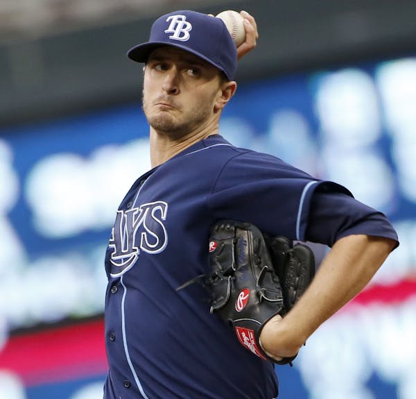 Tampa Bay Rays starter Jake Odorizzi fires a pitch during the first inning against the Minnesota Twins at Target Field Friday, May 15, 2015, in Minnea