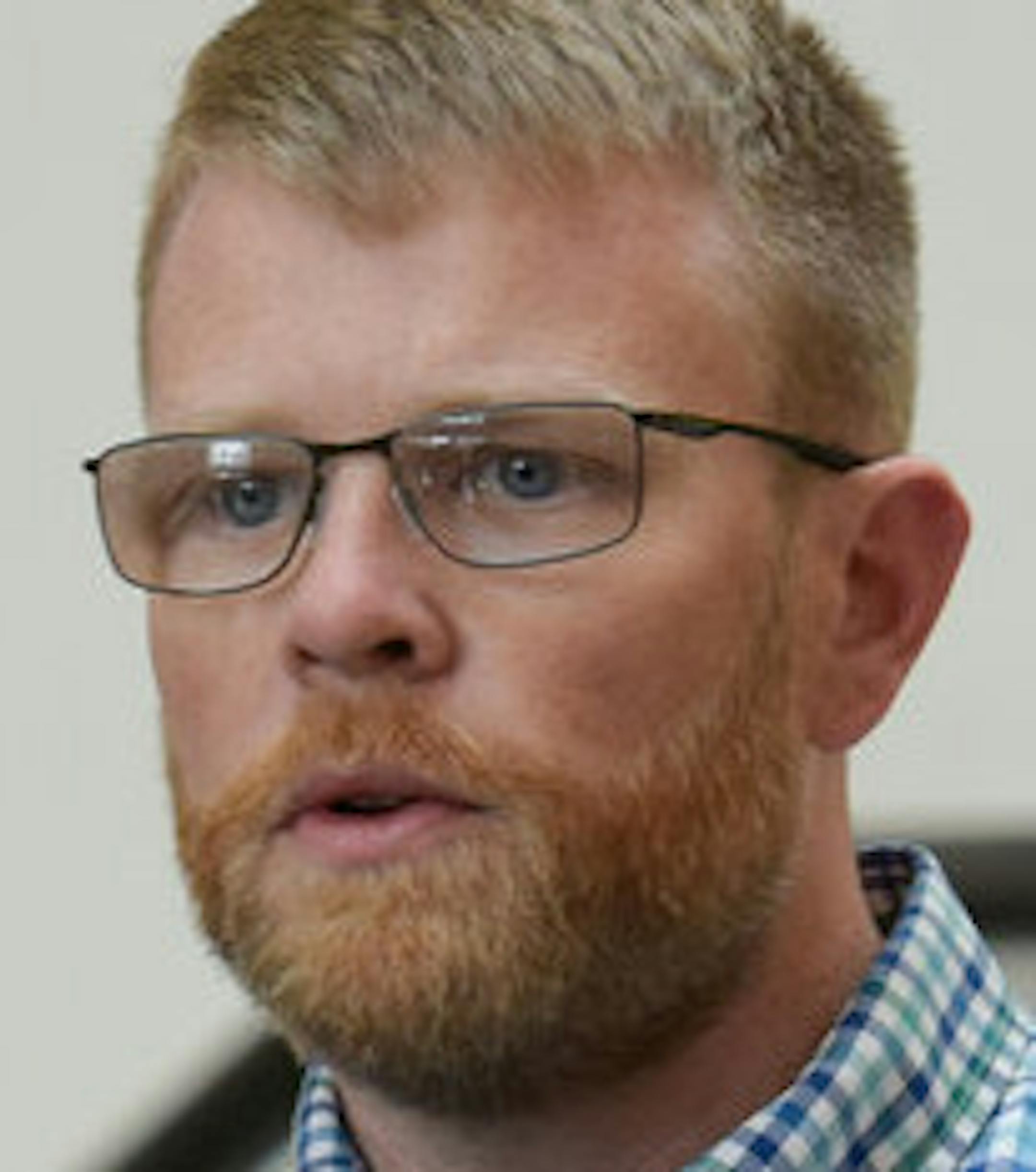 Superior Mayor Jim Paine addresses media at the Douglas County Government Center one day after an explosion and fire at the Husky Energy refinery in his city. Standing to his left is Superior Fire Chief Steve Panger.