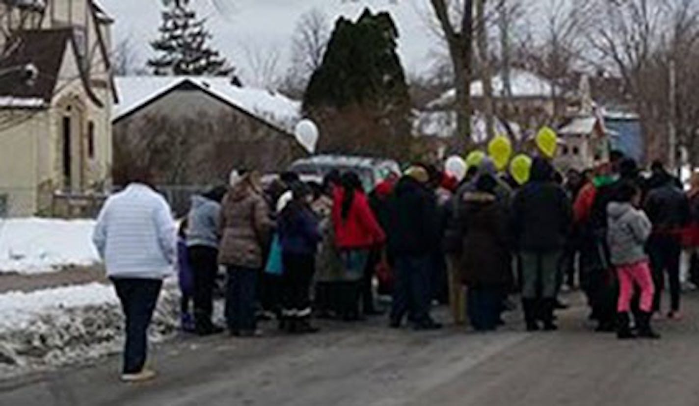 Sunday's vigil at 39th and Lyndale avenues N. remembered Aisha Freels, 37, a mother of four killed by a hit-and-run driver.