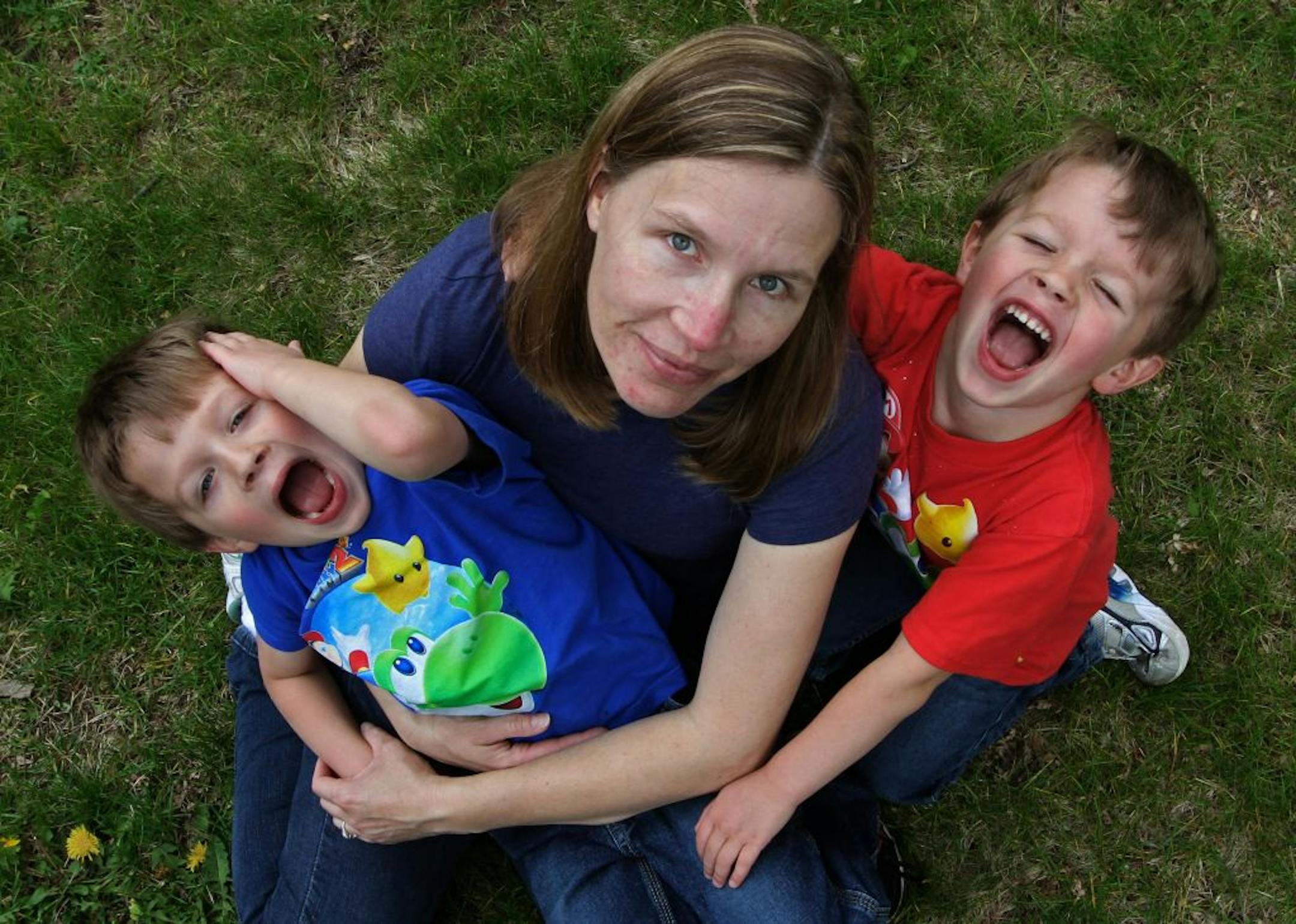 Noah, Lanica and Micah Klein played in the back yard of their Minnetonka home.