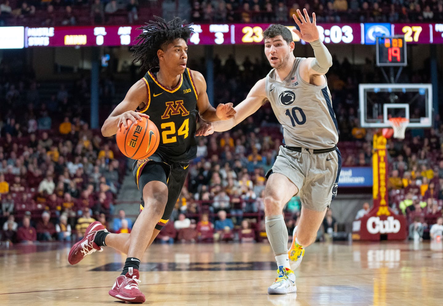 Minnesota forward Jaden Henley (24) drives to the basket past Penn State guard Andrew Funk (10) in the first half Saturday, Feb. 18, 2023 at Williams Arena in Minneapolis. ]