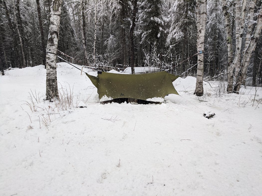Isaac Ortman’s hammock camping setup keeps him warm, even when the temperatures plunge.