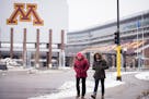 Haley Kimmet walked near TCF Bank Stadium while being given a tour of the University of Minnesota Campus by friend Sohail Akhavein on Friday afternoon