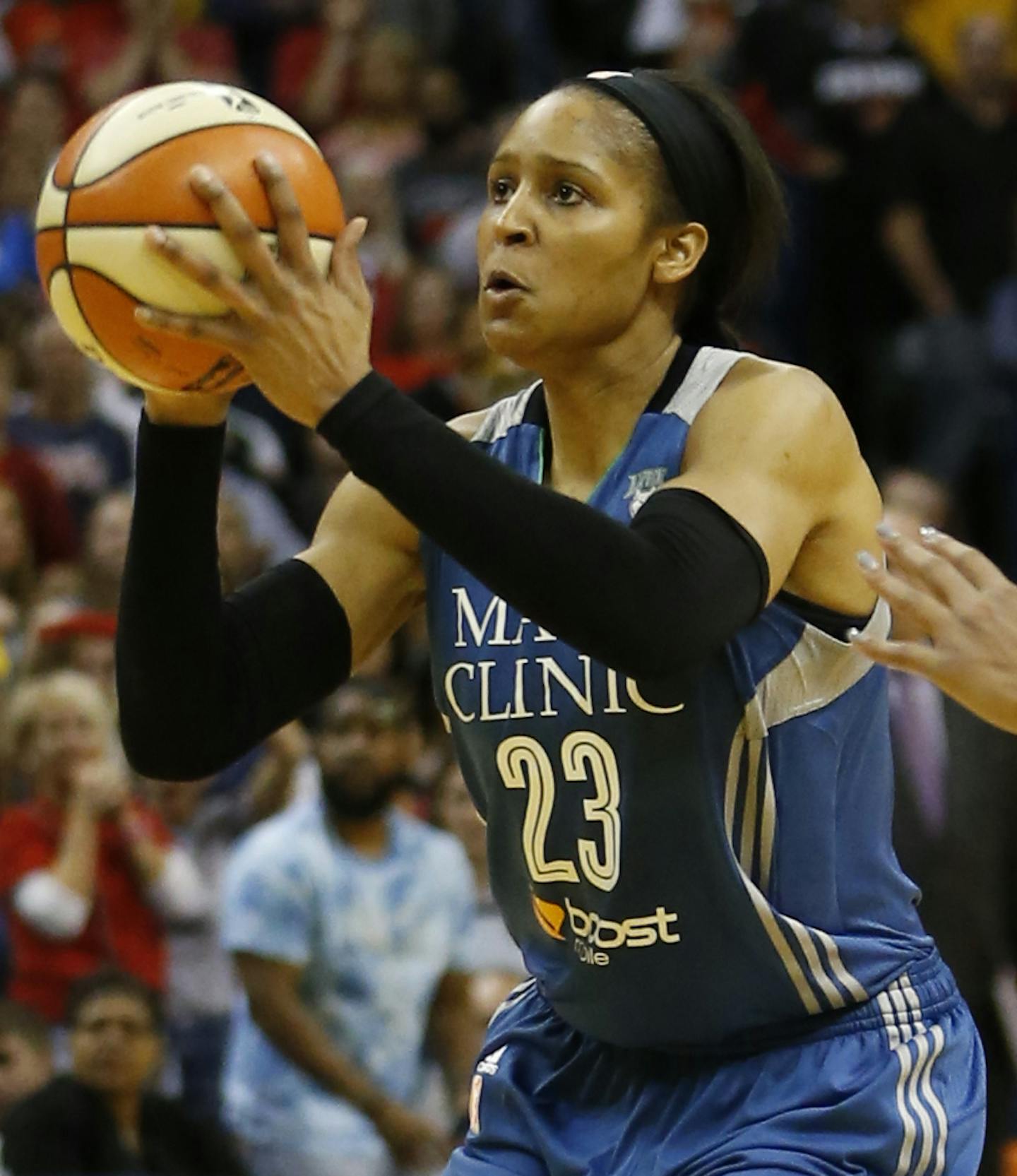 Minnesota Lynx forward Maya Moore (23) shoots a game winning three-pointer in the second half of Game 3 of the WNBA Finals basketball series against the Indiana Fever, Friday, Oct. 9, 2015, in Indianapolis. Lynx won 80-77. (AP Photo/AJ Mast)