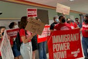 Immigrant rights advocates on Thursday rallied outside the Minneapolis City Council chambers, demanding city leaders implement a list of “pro-immigr