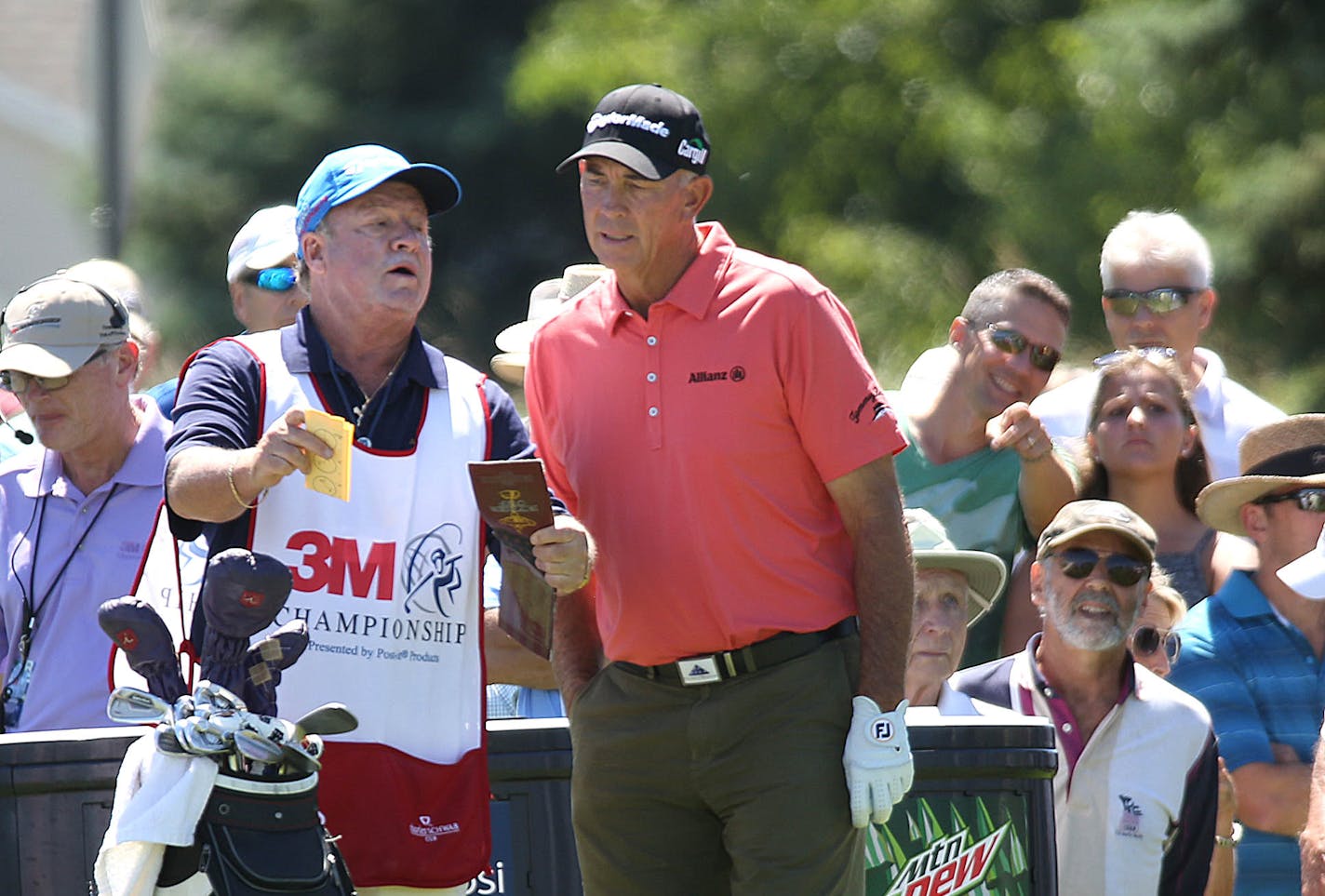 Tom Lehman talked with his caddie, Dennis Trixler.] JIM GEHRZ • james.gehrz@startribune.com / Blaine, MN / July 31, 2015 / 11:00 AM – BACKGROUND INFORMATION: First round action of the 3M Championship golf tournament at TPC Twin Cities in Blaine.