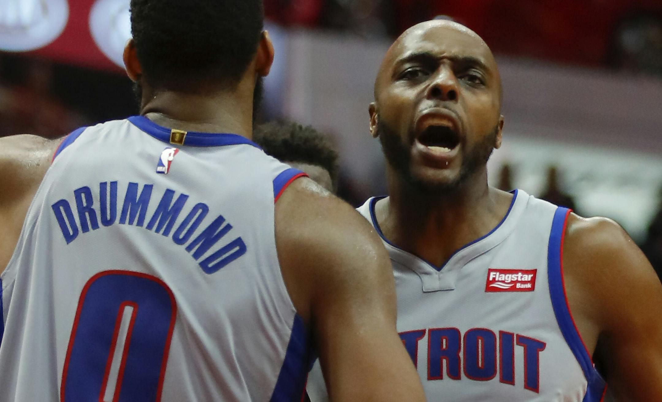 Detroit Pistons forward Anthony Tolliver (43) reacts with center Andre Drummond (0) in the second half of an NBA basketball game against the Atlanta Hawks on Sunday, Feb. 11, 2018, in Atlanta. (AP Photo/Todd Kirkland) ORG XMIT: GATK113