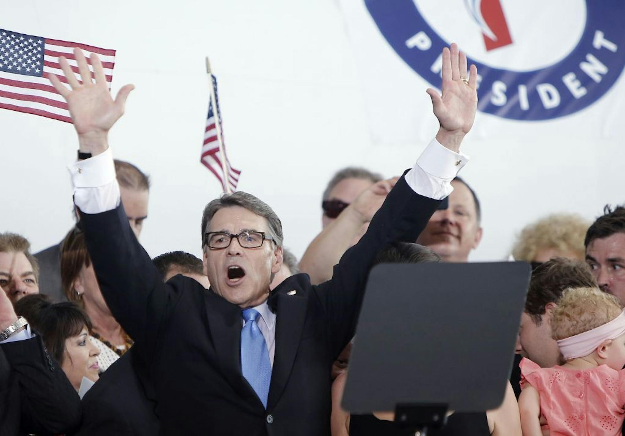 Former Texas Gov. Rick Perry announces his second presidential bid during a rally at the Addison airport on Thursday, June 4, 2015, in Addison, Texas. (Brandon Wade/Fort Worth Star-Telegram/TNS) ORG XMIT: 1169034 ORG XMIT: MIN1506041302470085