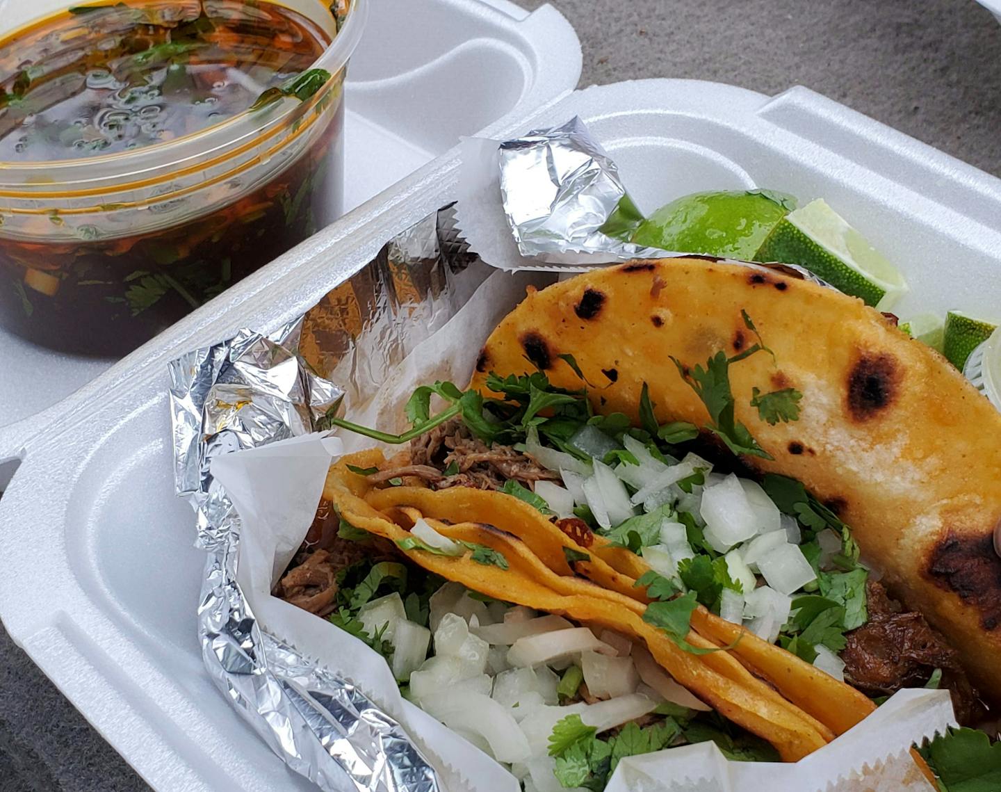 Birria beef tacos at Homi in St. Paul