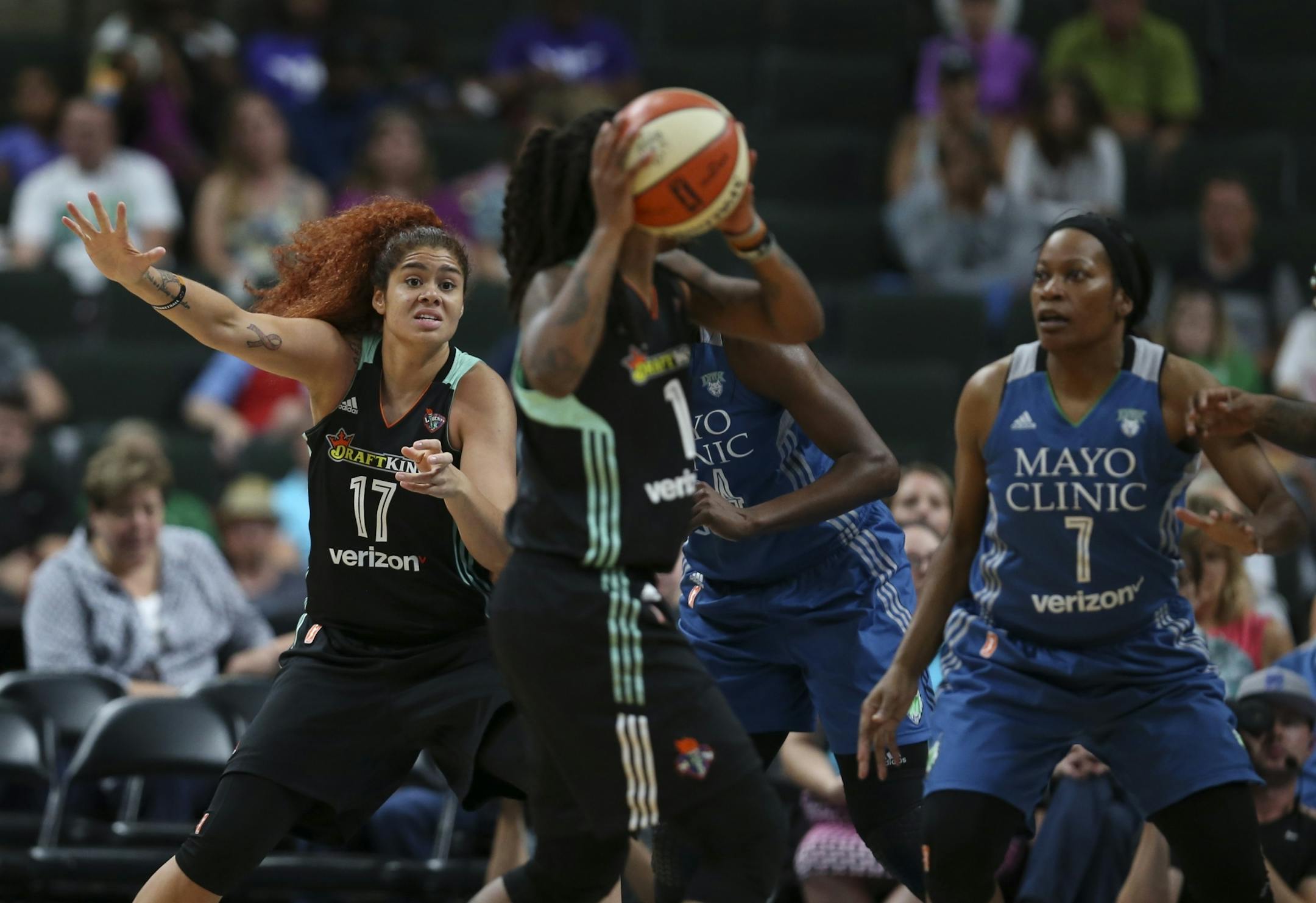 Former Gopher, New York Liberty center Amanda Zahui B. (17) tried to get the attention of her teammate New York Liberty guard Shavonte Zellous (1) in the second quarter.
