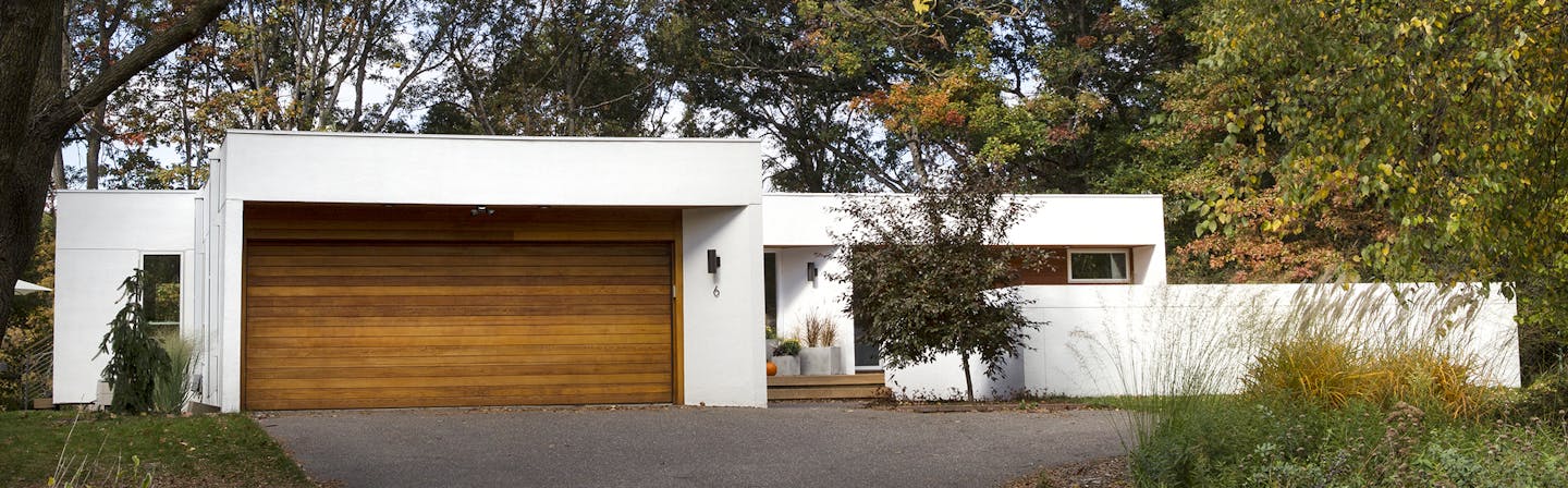 A dated 1970's home was given new life as a modern, functional family abode by Shelter Architecture.