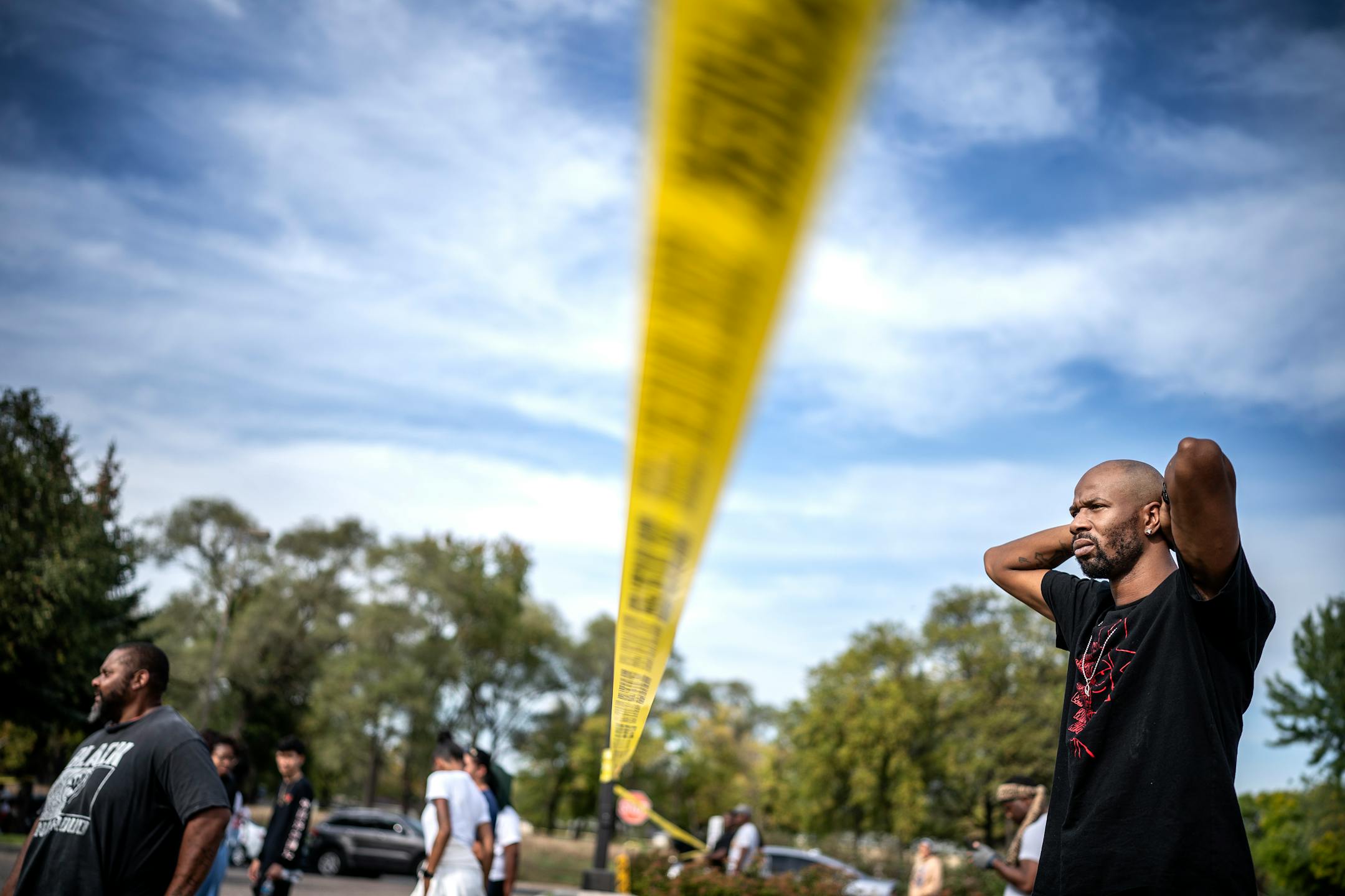 People gathered at the scene where a young man was shot and killed at the Speedway gas station near 69th and Brooklyn Blvd in Brooklyn Center.] Jerry Holt •Jerry.Holt@startribune.com