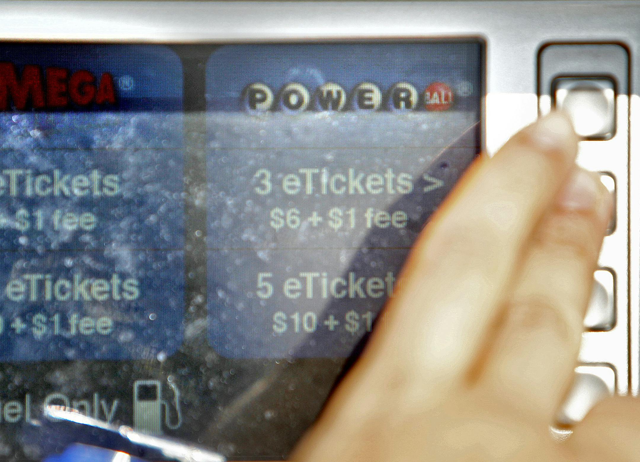 Minnesota has quietly debuted a lottery ticket for the 21st century: a paperless purchase at a gas station pump or ATM, with quick-pick numbers sent via text message to your cell phone, and small jackpots automatically deposited into your bank account. (ELIZABETH FLORES/STAR TRIBUNE) ELIZABETH FLORES • eflores@startribune.com