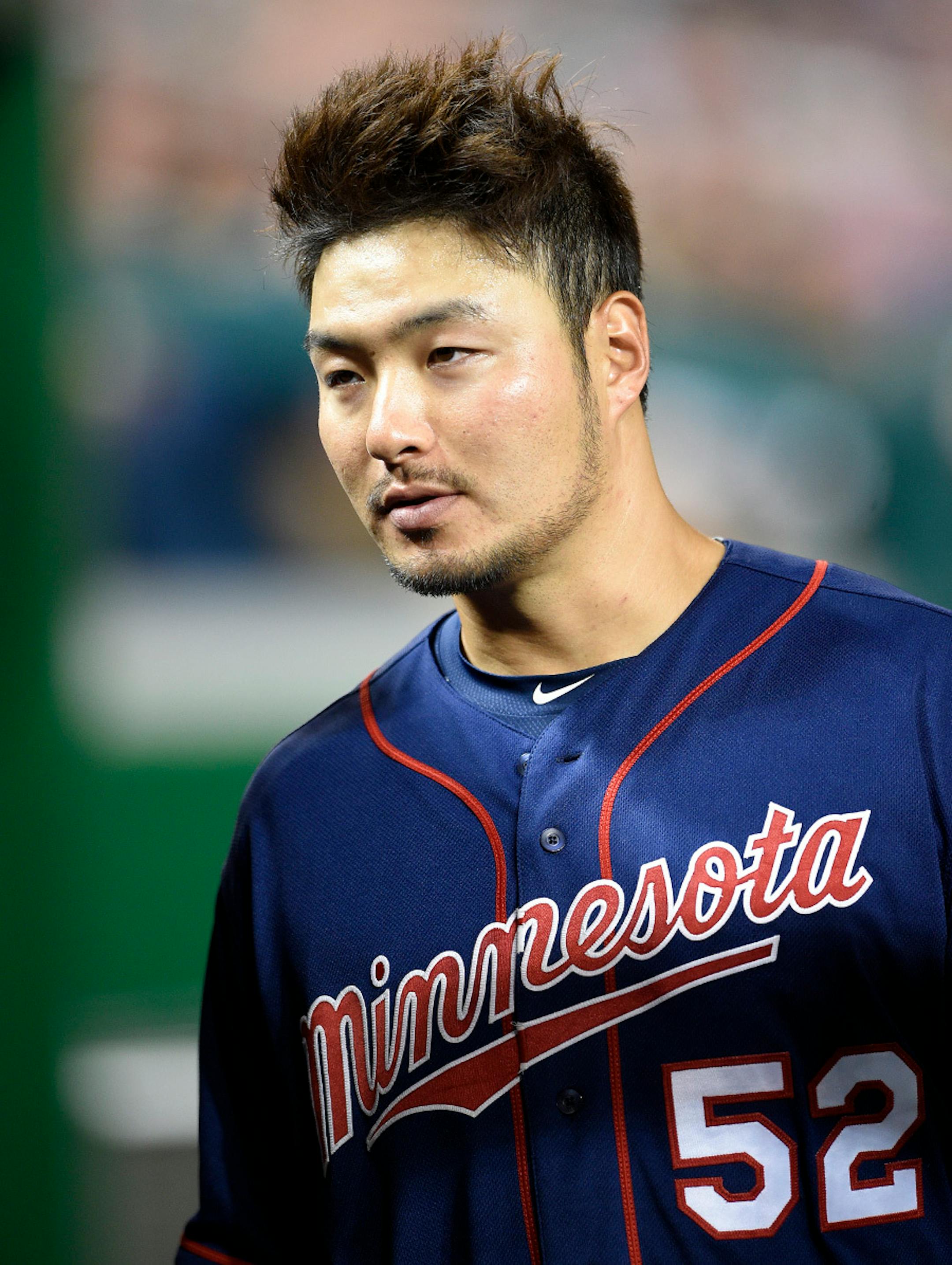 Minnesota Twins' Byung Ho Park, of South Korea, looks on during the sixth inning of an interleague exhibition baseball game against the Washington Nationals, Friday, April 1, 2016, in Washington. The Nationals won 4-3.