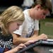 Sophomore Grasha Lund, 15, learned to use her new ipad during a Biology class at Waconia Senior High School, Wednesday, September 4, 2013. A new fiber