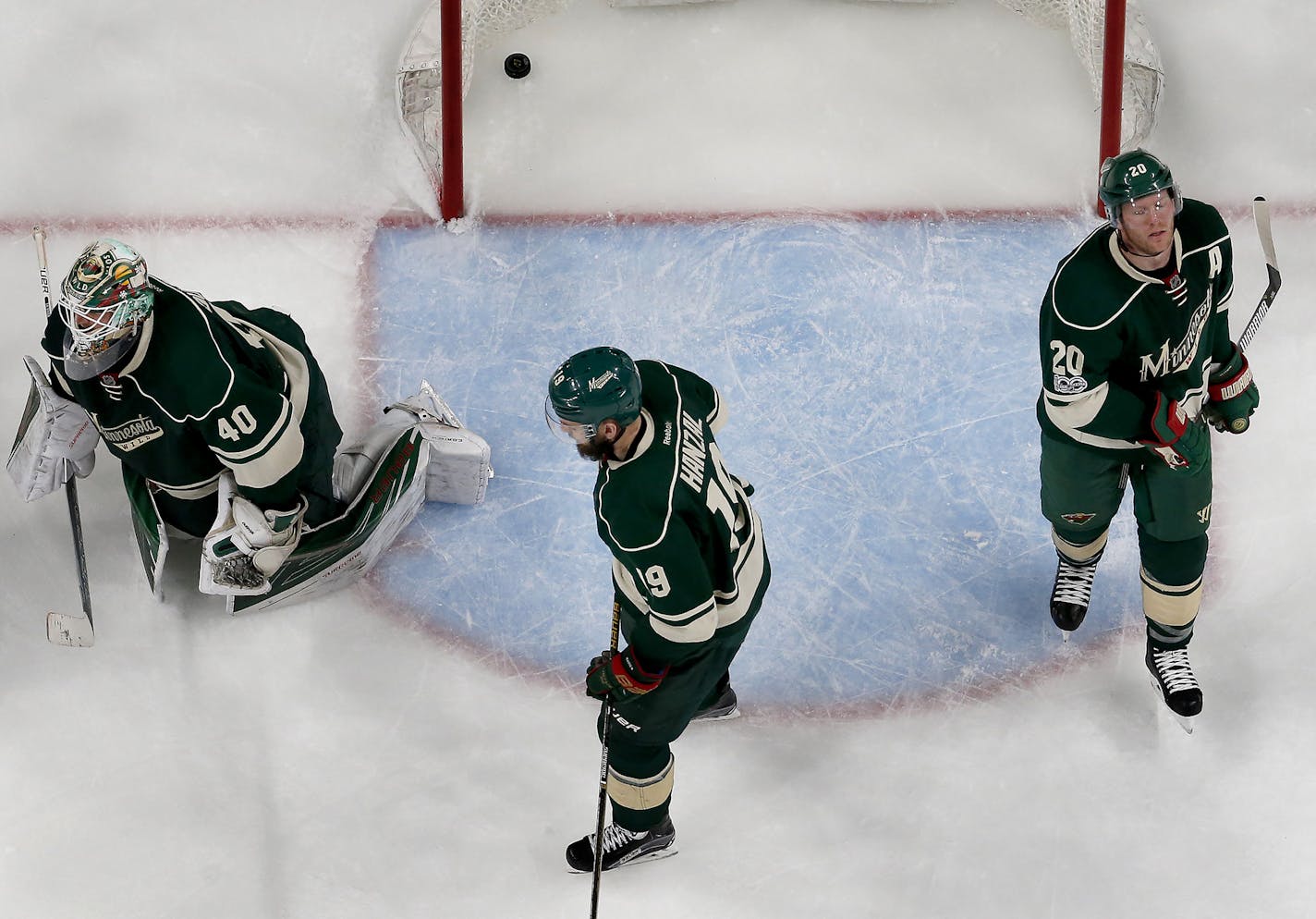 Minnesota Wild players Devan Dubnyk (40), Martin Hanzal (19), Ryan Suter (20) after the overtime loss to the St. Louis Blues. ] CARLOS GONZALEZ &#xef; cgonzalez@startribune.com - April 22, 2017, St. Paul, MN, Xcel Energy Center, NHL, Stanley Cup Playoffs, Game 5, Minnesota Wild vs. St. Louis Blues