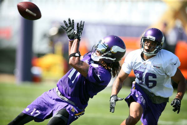 Jarius Wright caught a pass over Robert Blanton during practice at Minnesota State University Sunday July 26, 2015 in Mankato, MN. Jerry Holt/ Jerry.H