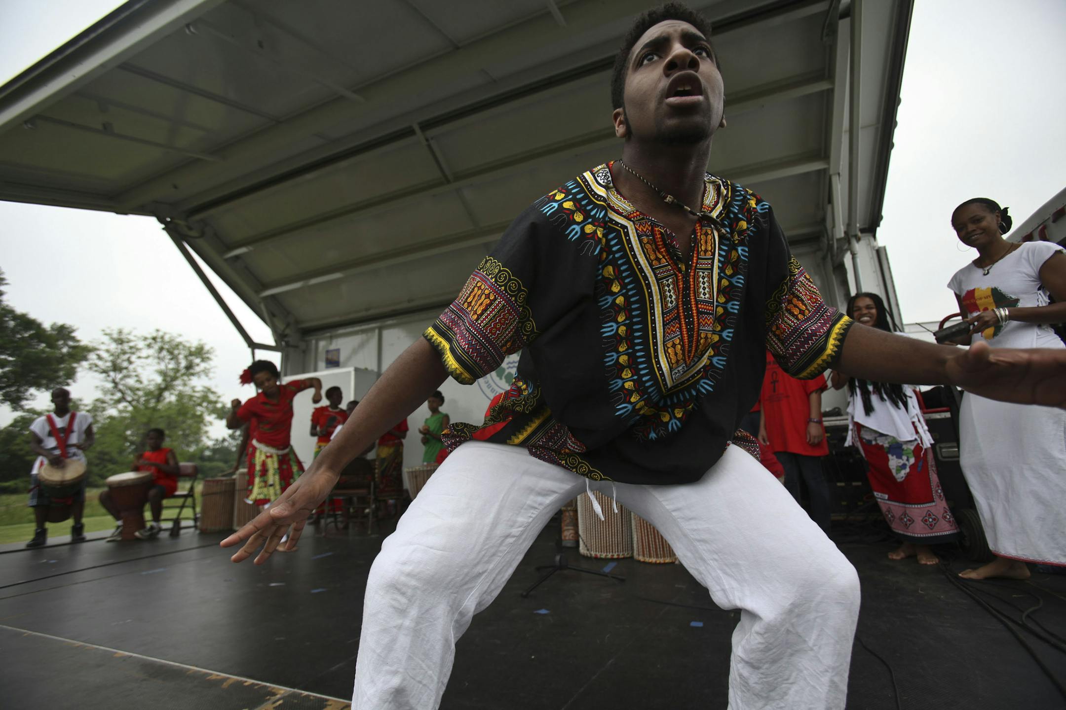 KYNDELL HARKNESS ‚Ä¢ kyndell.harkness@startribune.com MINNEAPOLIS 06/18/11 26th annual Juneteenth at North Mississippi Regional Park. IN THIS PHOTO ] Julian Hines, 23, of Voice of Culture, performed along with the We Win Institute African dance and drumming at the 26th annual Juneteenth celebration at North Mississippi Regional Park. ORG XMIT: MIN2013060415115080