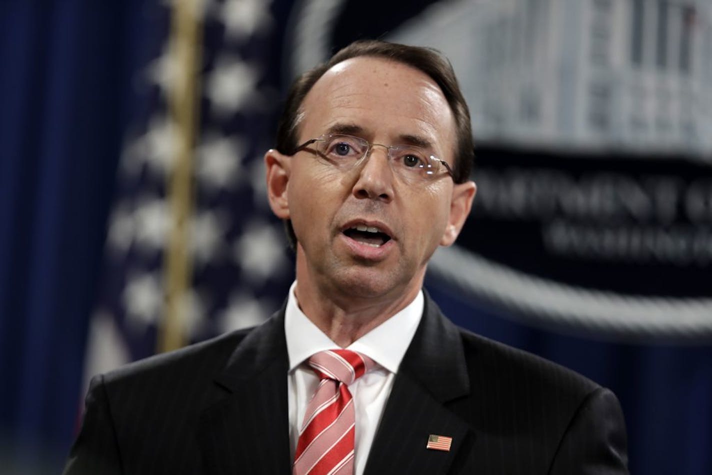 FILE - In this July 13, 2018, file photo, Deputy Attorney General Rod Rosenstein speaks during a news conference at the Department of Justice.