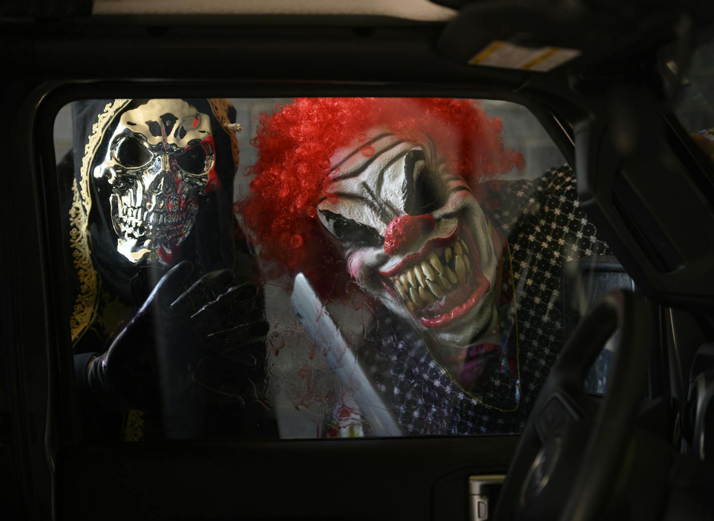 "Deadly Drive-In" co-creators Matthew Felt, left, and Chad Kampe posed for a portrait Wednesday afternoon at Rosedale Center. ] aaron.lavinsky@startribune.com Imagine being stuck in your car. You can't move because someone has taken your car keys. You're surrounded by fog and scary sounds and the knowledge that somewhere nearby is a homicidal maniac. Welcome to the Halloween attraction in the age of covid. Though a few local haunted houses have fallen victim to the pandemic, shutting their doors