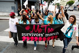 Sexual assault survivors along with their supporters at the #MeToo Survivors March against sexual abuse Sunday, Nov. 12, 2017 in Los Angeles, Calif. A