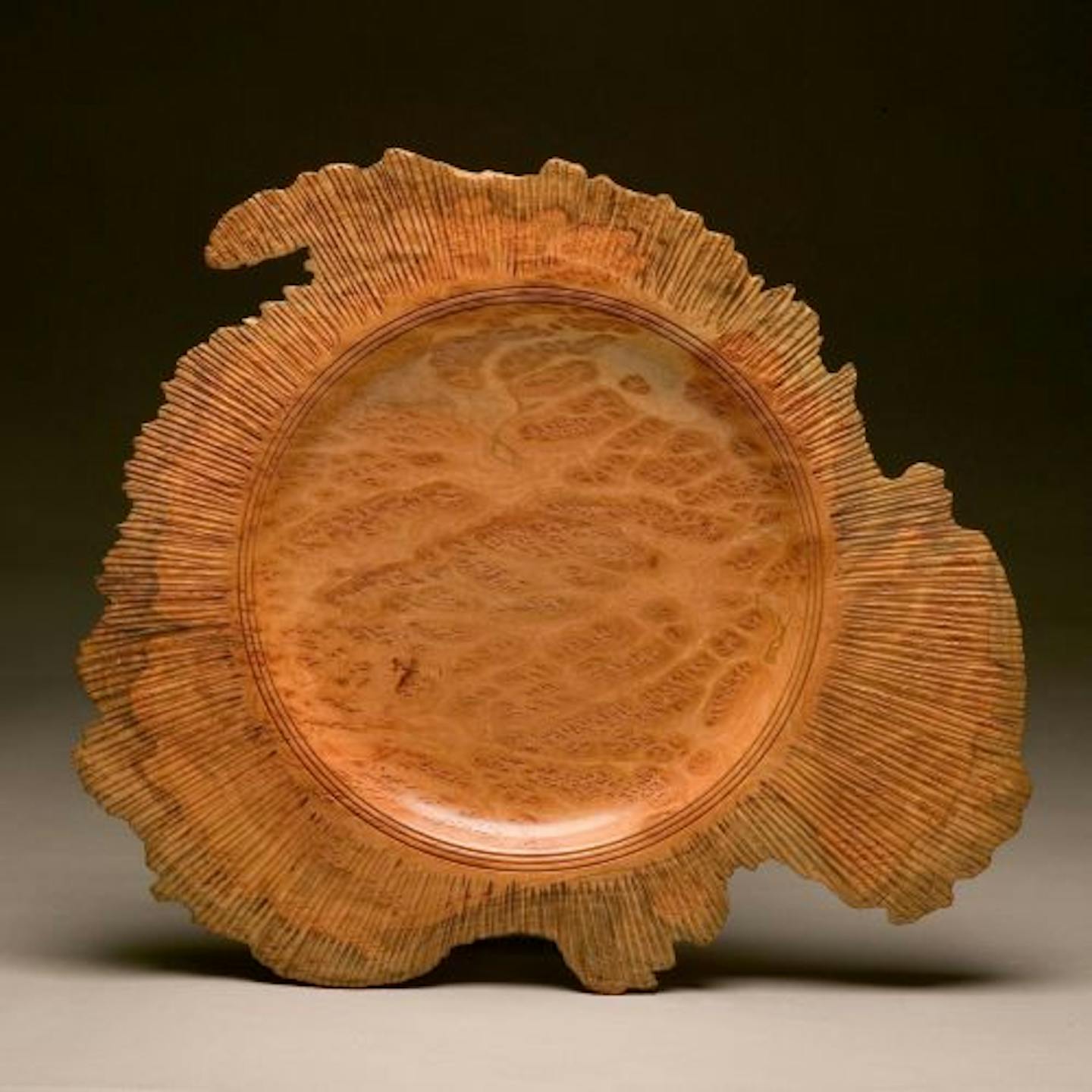 These wooden platters from artist Tom Larson are 21 inches in diameter. Larson is among the artists at the American Craft Council show.