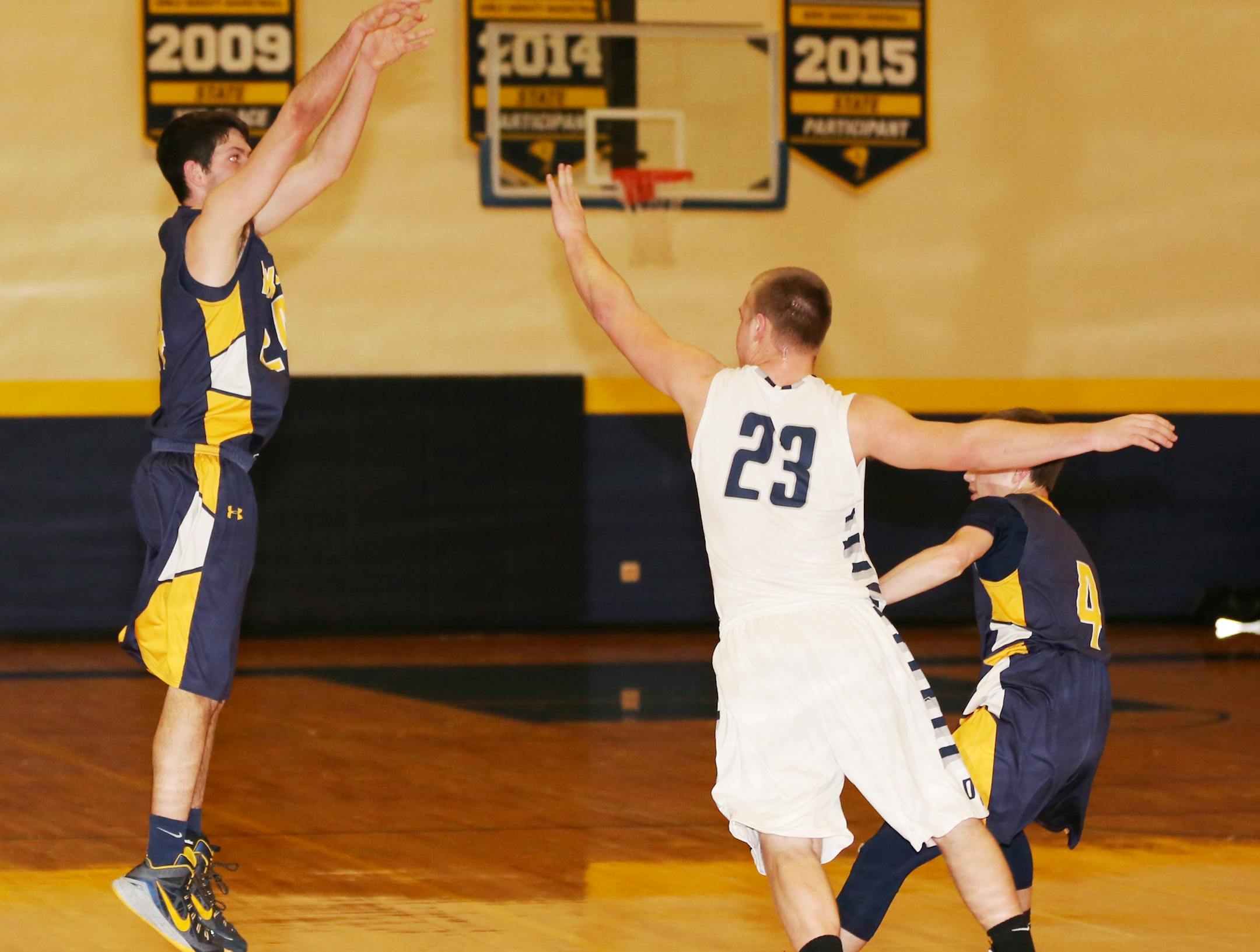 Howard Lake-Waverly-Winsted guard Cole Gagnon follows through after launching the three-pointer that put him over 1,000 points for his career in a game against Dassel-Cokato on Jan. 16, 2016.