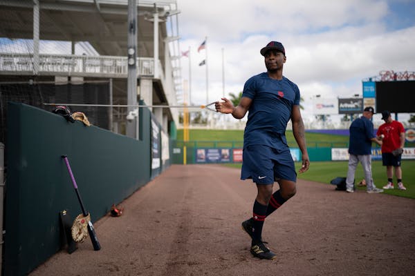 Jharel Cotton worked out with rubber bands at Twins training camp in Fort Myers, Fla., on Tuesday.
