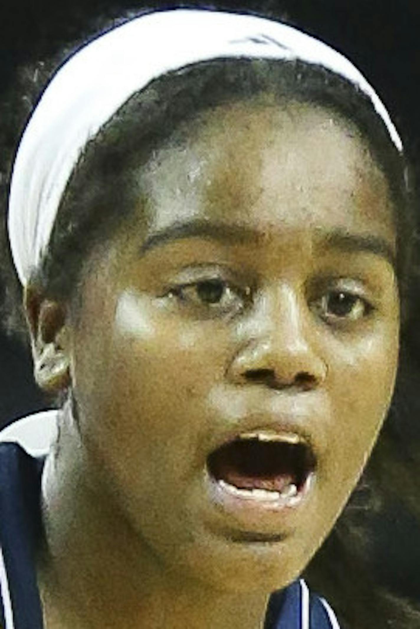 Michigan guard Siera Thompson (2) yells to her teammates as she dribbles the ball in the second half of an NCAA college basketball game at the Barclays Center Women&#xed;s Invitational at the Barclays Center, Friday, Nov. 29, 2013, in New York. Michigan 82-71. (AP Photo/John Minchillo) ORG XMIT: NYJM107