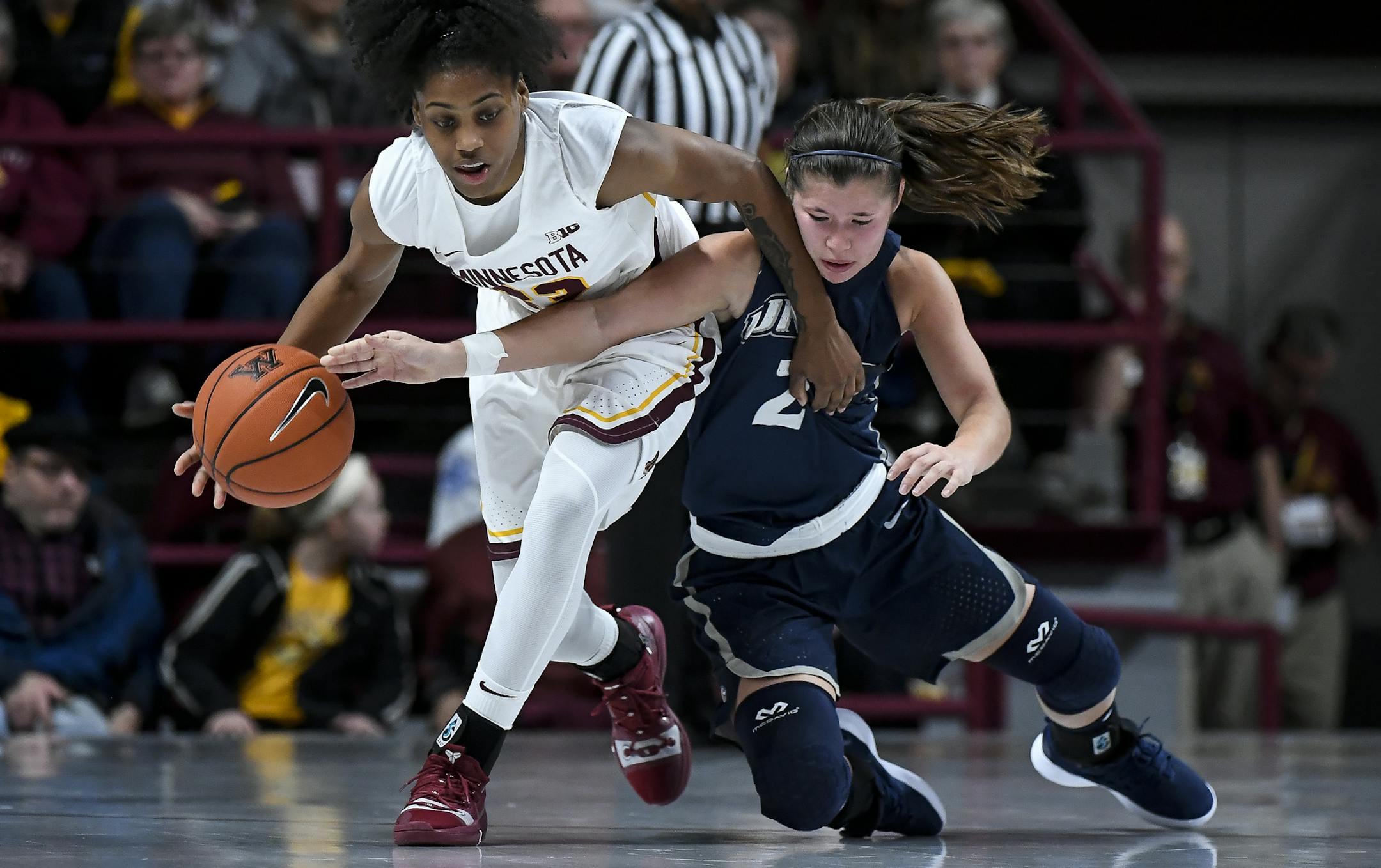 Minnesota Golden Gophers guard Kenisha Bell (23) and New Hampshire Wildcats guard Kari Brekke (2) collided while battling for a loose ball in the second half Friday. ] Aaron Lavinsky • aaron.lavinsky@startribune.com The University of Minnesota Golden Gophers played the New Hampshire Wildcats on Friday, Nov. 9, 2018 at Williams Arena in Minneapolis, Minn.