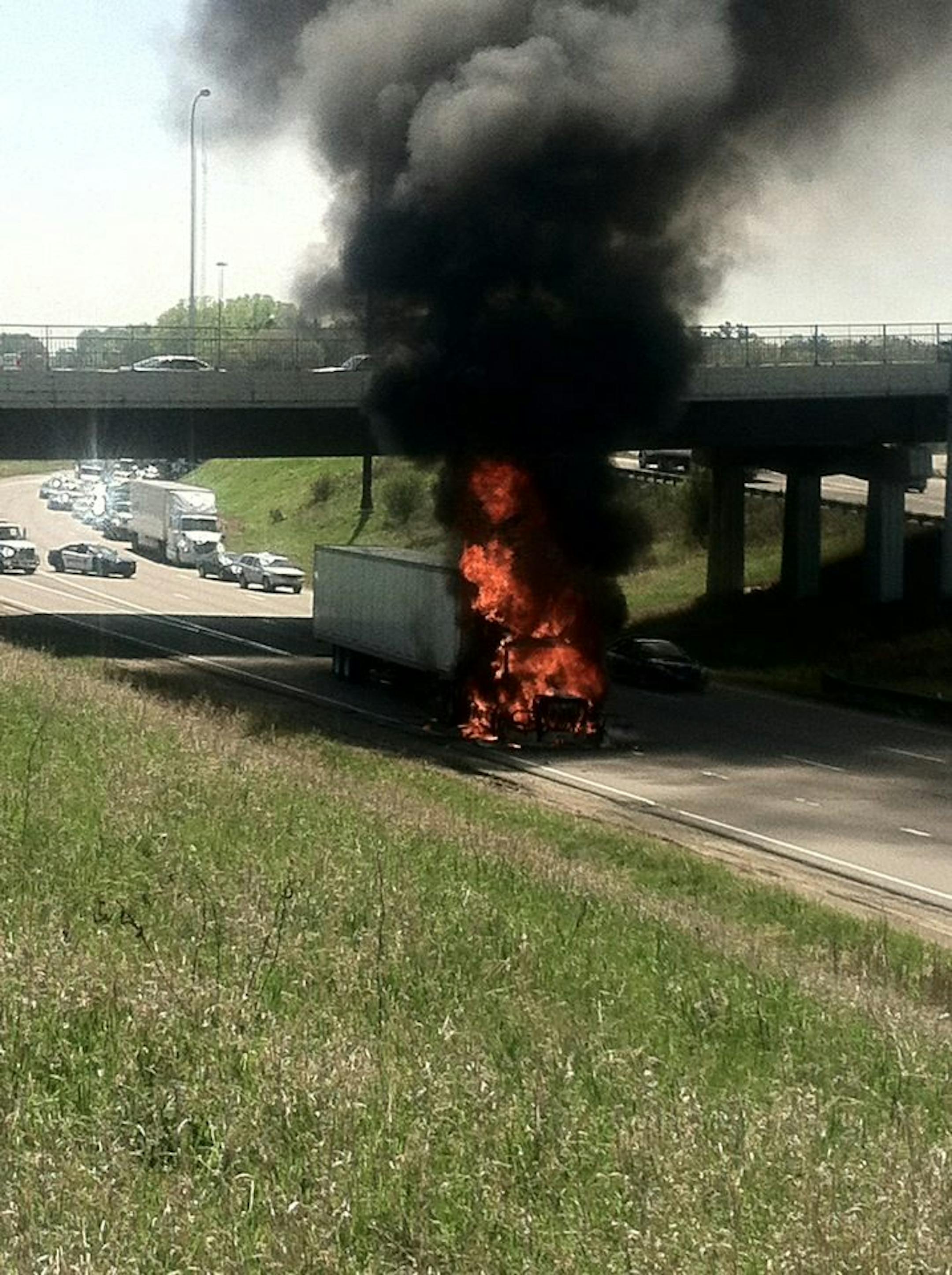The driver was able to escape before flames engulfed the cab of his truck Tuesday on northbound Interstate 35W before firefighters arrived and before all traffic lanes were closed. This view is from Cleveland Avenue just north of County Road B2.