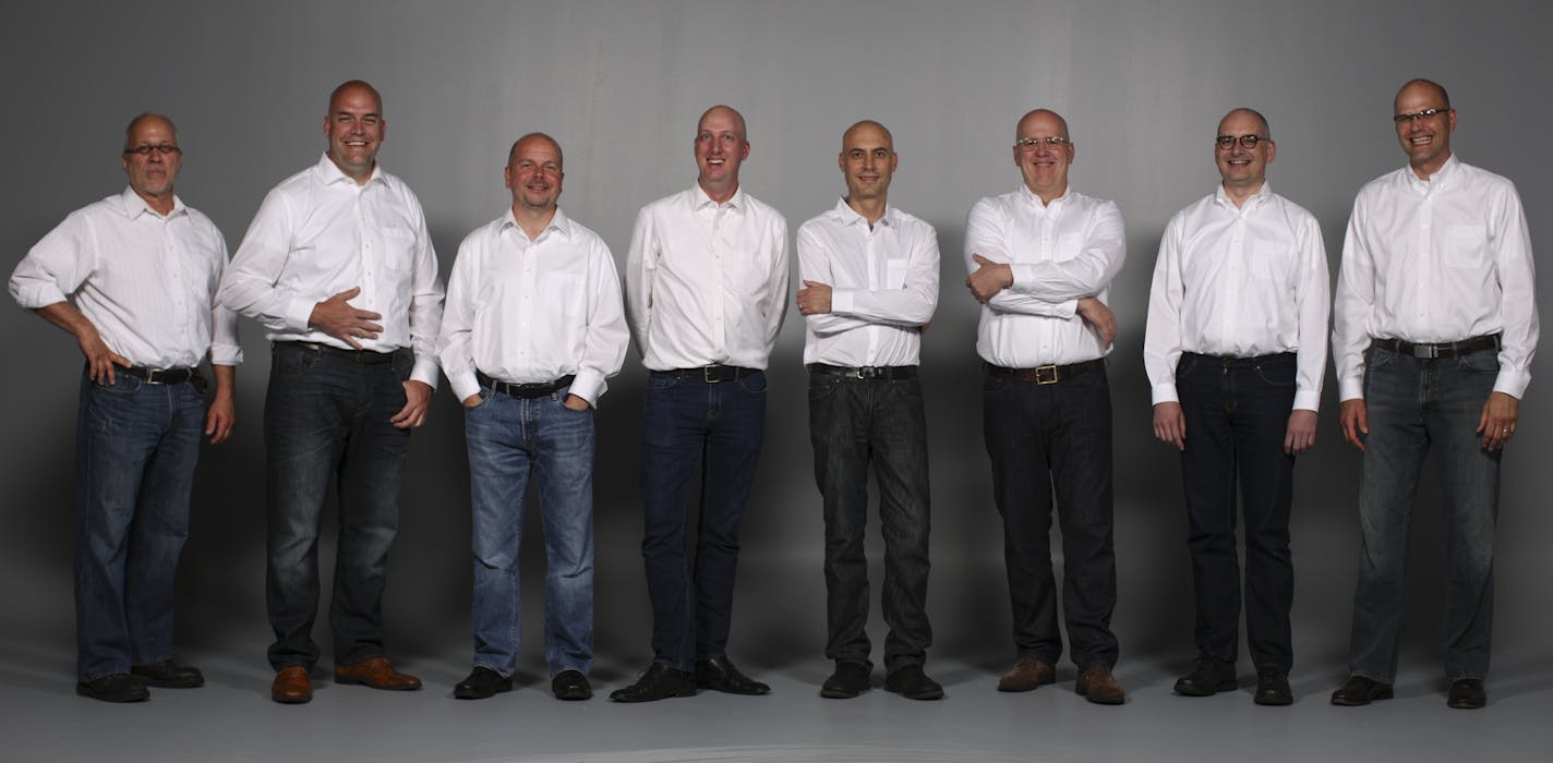 Star Tribune restaurant critic Rick Nelson, third from right, with a collection of doppelg&#xe4;ngers, all culled from various Star Tribune departments, photographed in the studio Monday afternoon.