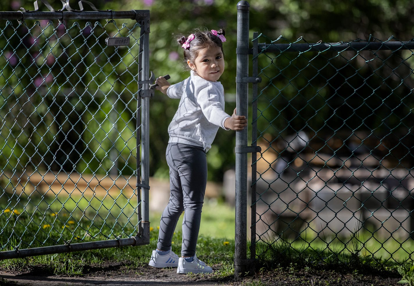 Aviana Castro, 3 daughter of Jessica Aguilar headed to the backyard to play on a trampoline. ] CARLOS GONZALEZ • cgonzalez@startribune.com - Blaine, MN – May 19, 2020, Jessica Aguilar was brought into the U.S. from Mexico as a baby by her parents without legal permission and eventually won legal protection under DACA. Now she's among 800,000 young undocumented immigrants awaiting the Supreme Court's decision on whether to eliminate the program.