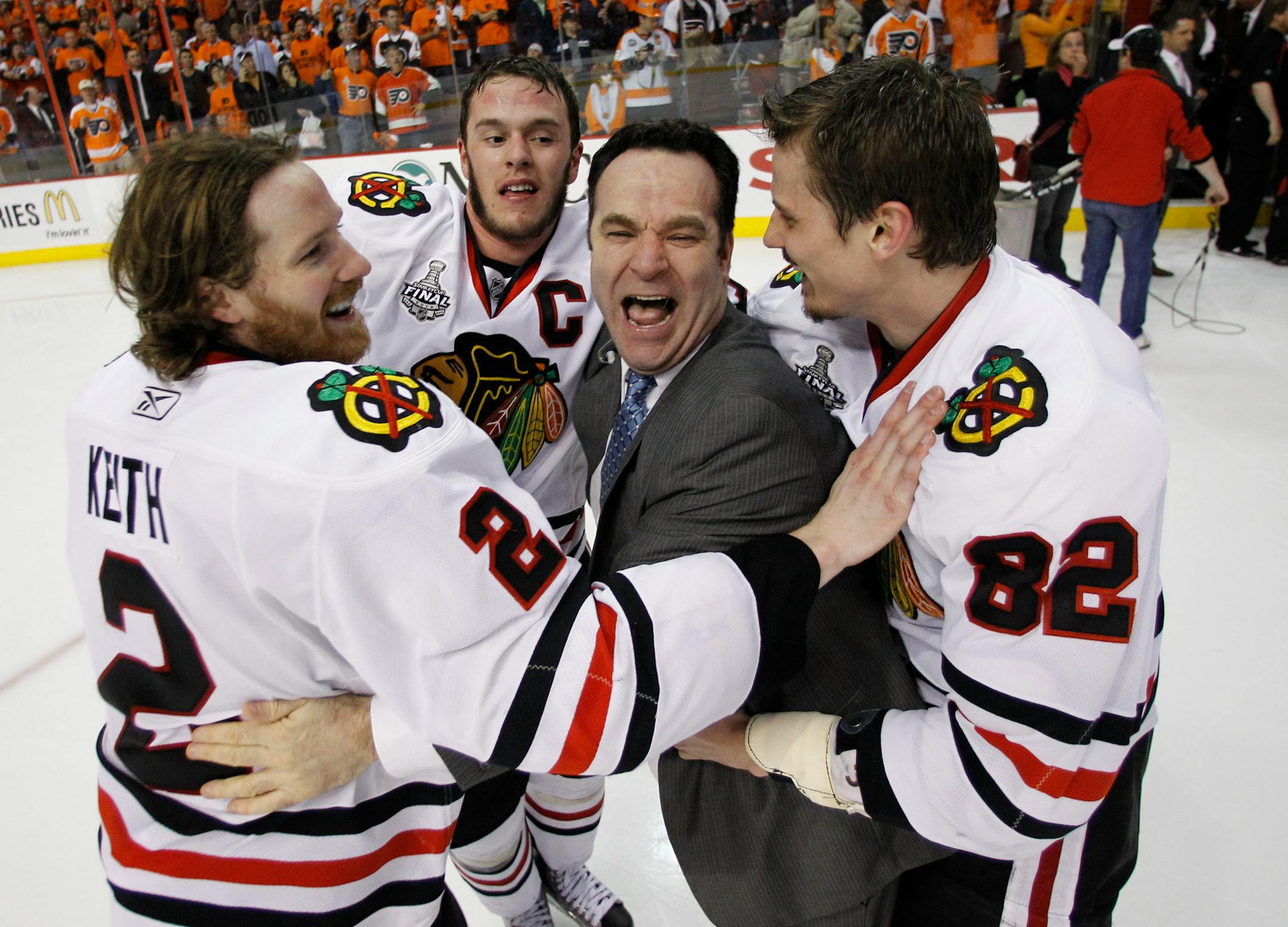 Assistant coach John Torchetti, center, celebrated with Duncan Keith (2), Jonathan Toews, second from left, and Tomas Kopecky after the Chicago Blackhawks won the 2010 Stanley Cup.