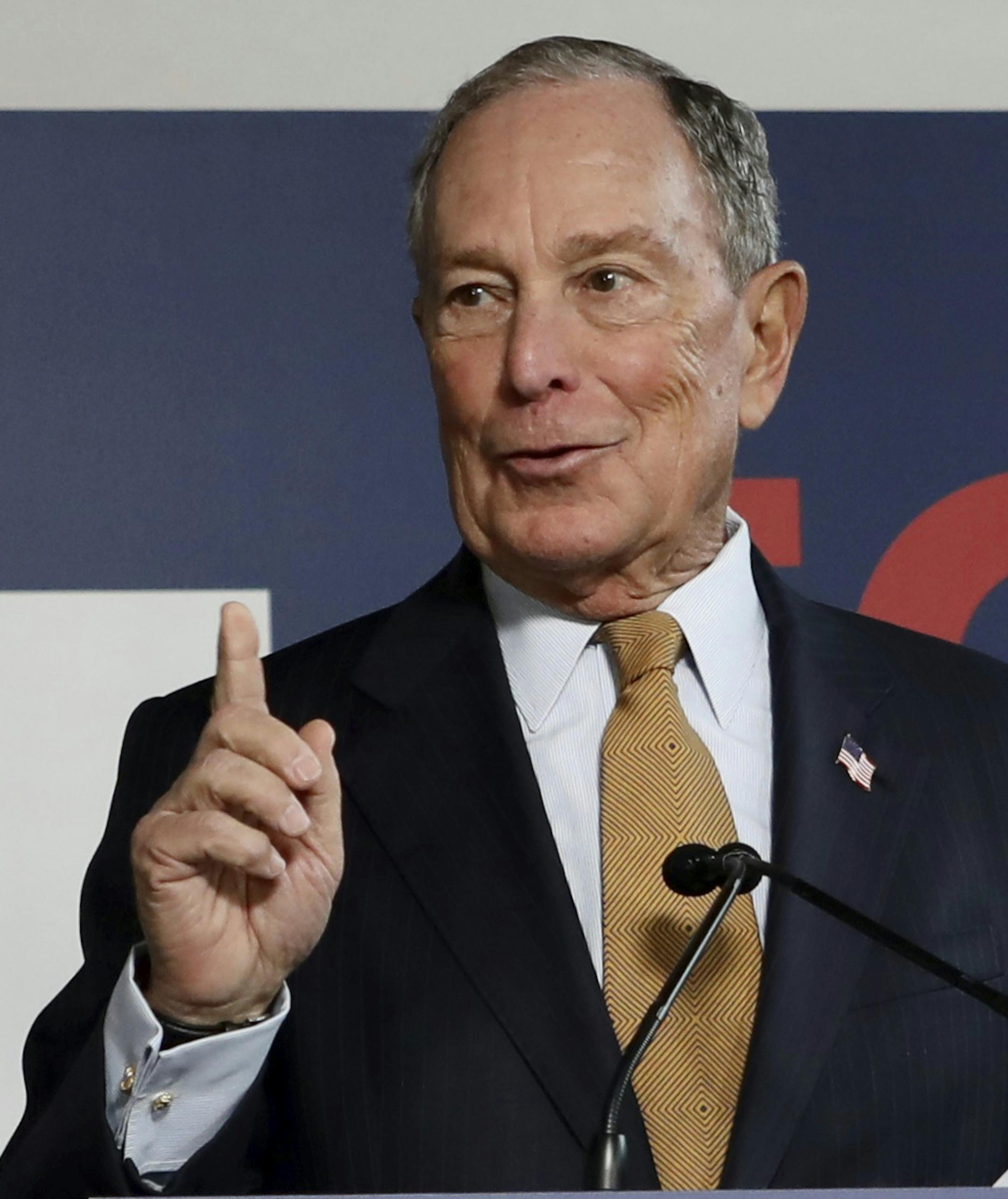 Democratic presidential candidate Michael Bloomberg greets the crowd gathered for his speech during the opening of the Bloomberg for North Carolina headquarters in Raleigh, N.C., on Friday, Jan. 3, 2020. (Caleb Jones/The News & Observer via AP)