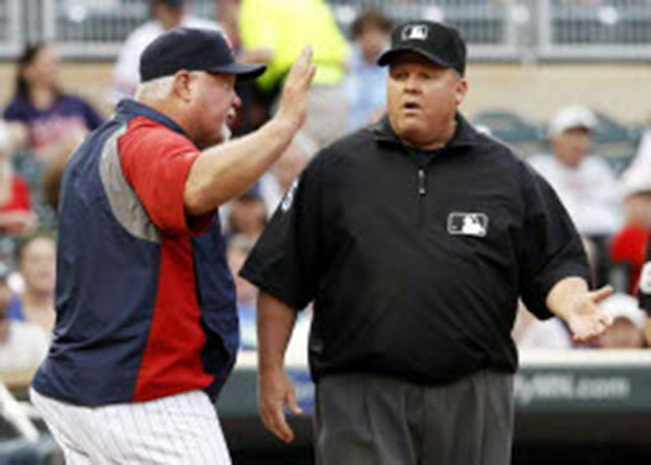 Twins manager Ron Gardenhire argued with third base umpire Fieldin Culbreth after being ejected during the first inning against Kansas City on Monday.