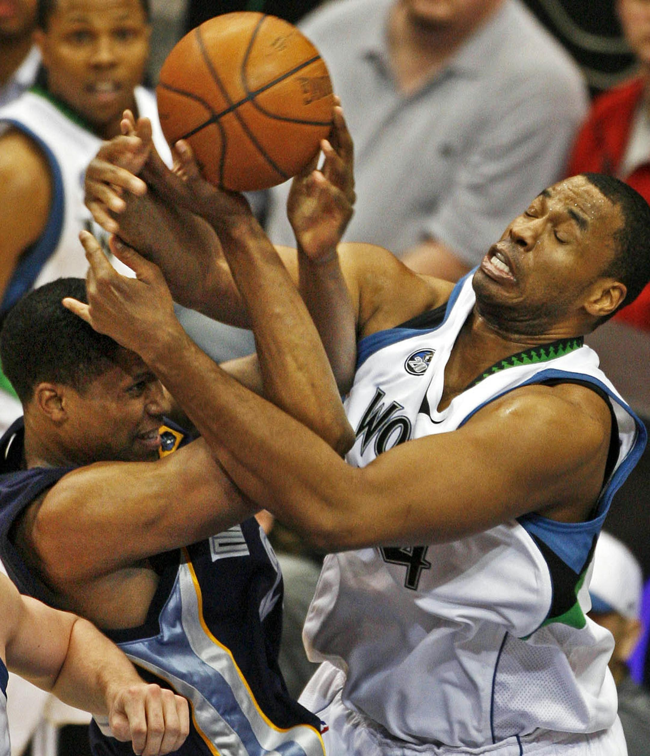 Former Wolves center Jason Collins, right blocked the shot of Memphis' Rudy Gay during a game at Target Center in 2009.