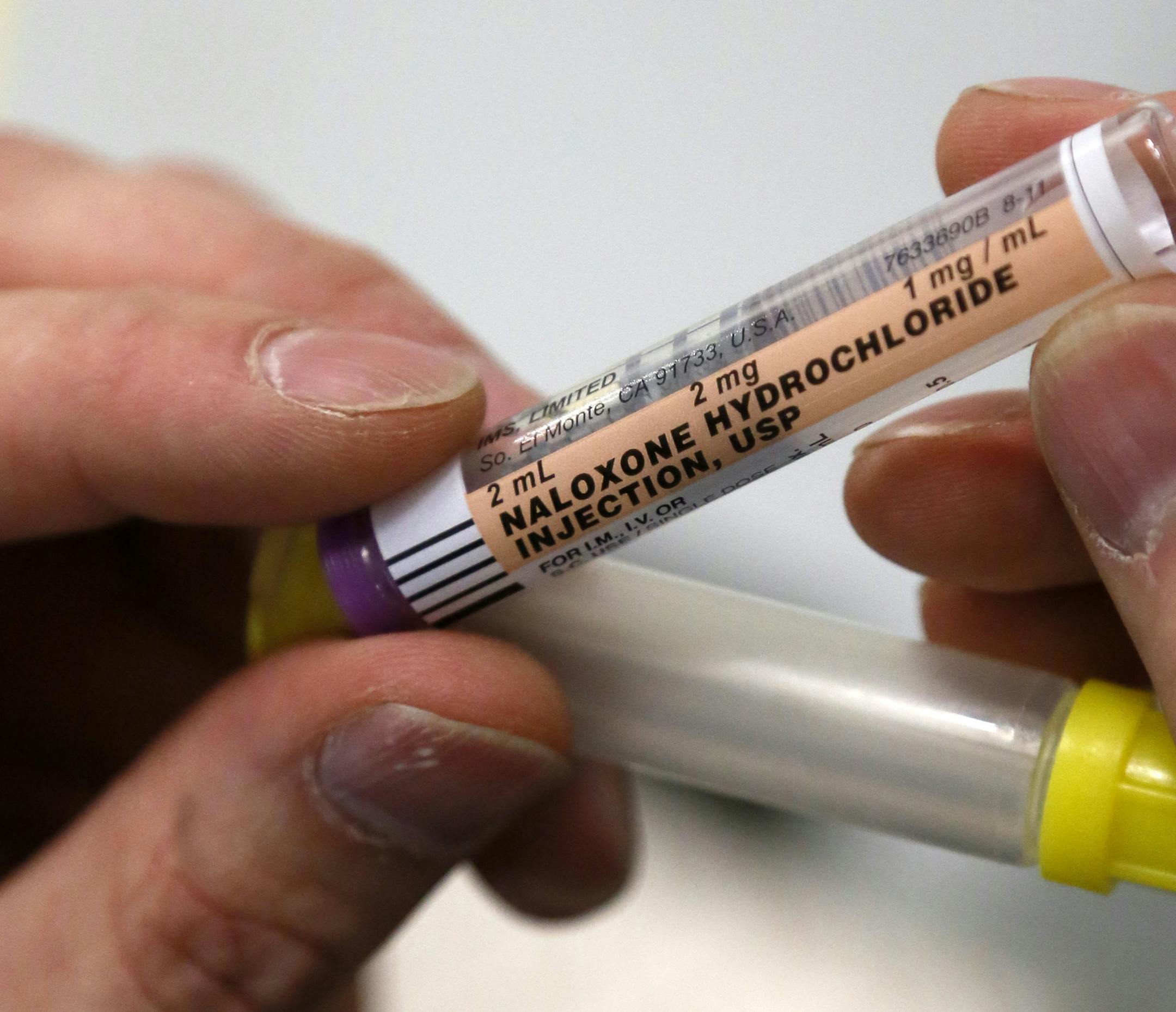 La Crosse Wisc. firefighters could soon carry with them a powerful antidote to the heroin overdoses they're increasingly responding to. Right now, only paramedics can administer Naloxone. Some Minnesota lawmakers, too, want to open up access to the drug, putting it in the hands of first responders. Here, Nick Eastman, a paramedic with Tri-State in LaCrosse, Wisc. talks about his experience with Naloxone. ] La Crosse, WI - 11/06//2013