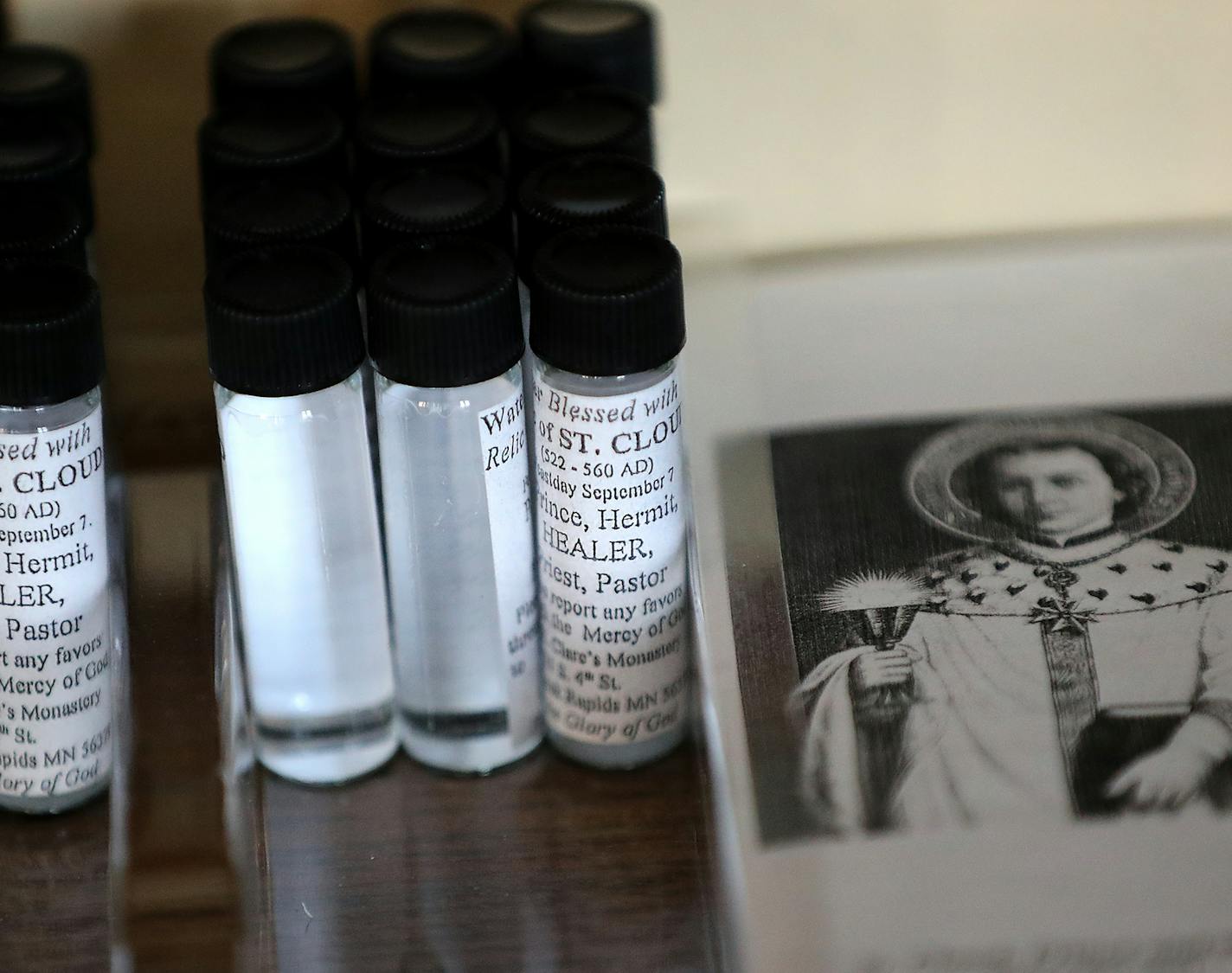 Vials of St. Cloud water for healing outside the St. Clare's Monastery Chapel in Sauk Rapids, Minn.