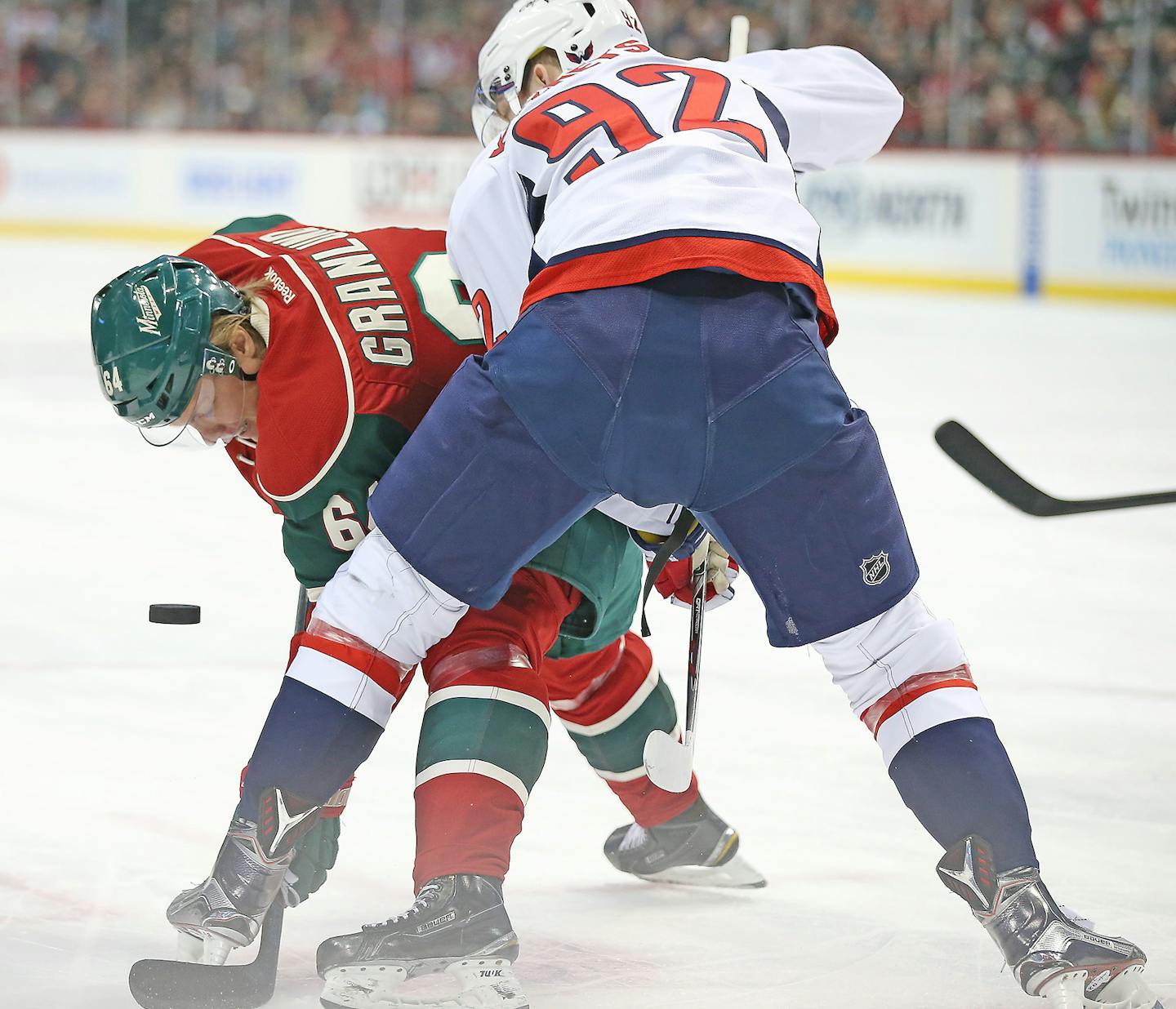 Minnesota Wild center Mikael Granlund and Washington Capitals center Evgeny Kuznetsov face off in the first period as the Wild took on Washington at the Xcel Energy Center, Thursday, February 11, 2016 in St. Paul, MN. ] (ELIZABETH FLORES/STAR TRIBUNE) ELIZABETH FLORES &#x2022; eflores@startribune.com