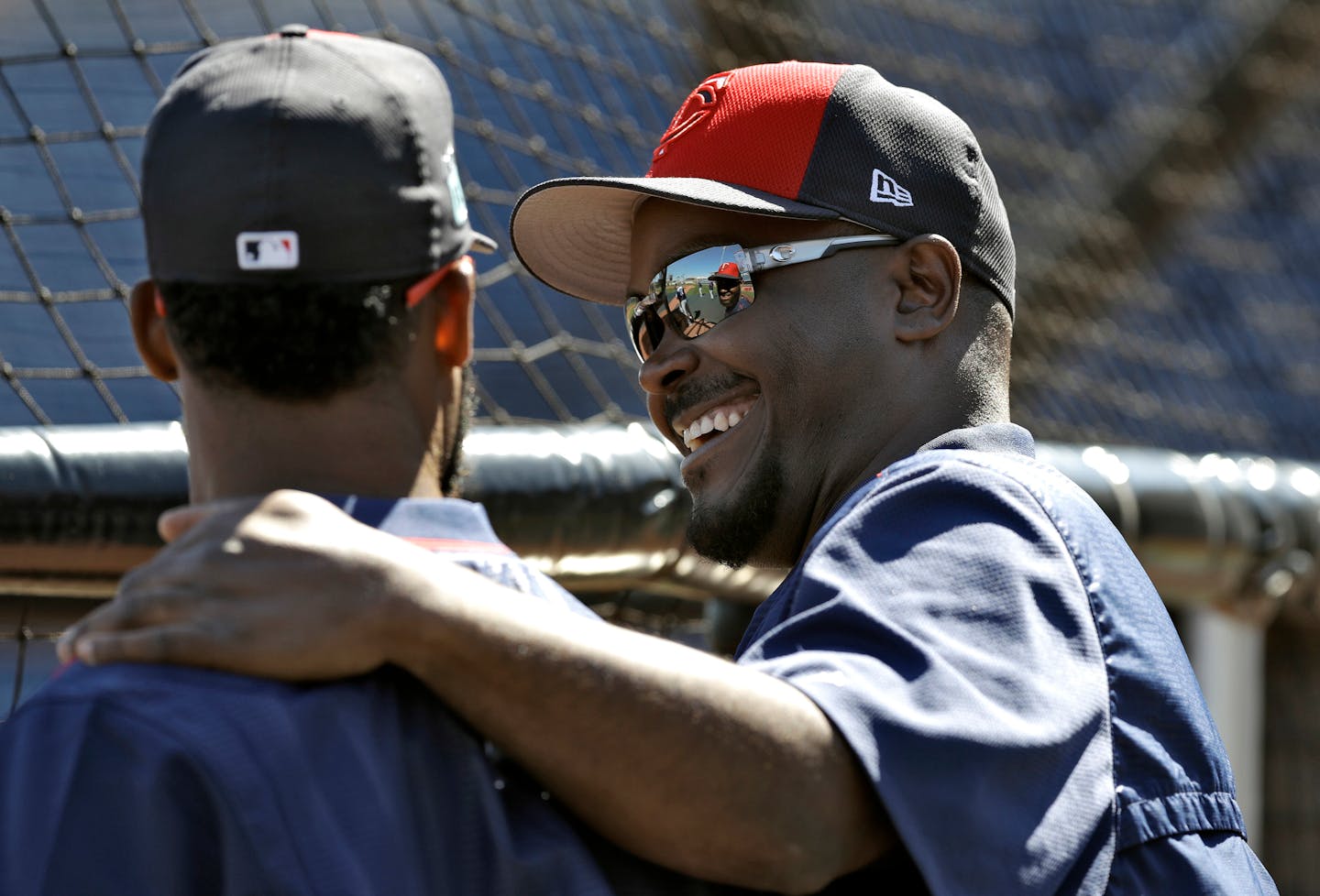 Minnesota Twins hitting coach James Rowson, right