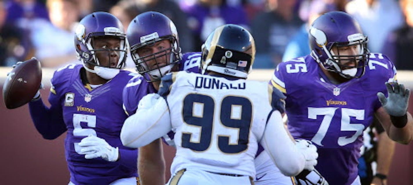 Minnesota Vikings quarterback Teddy Bridgewater (5) looked to pas down field in the forth quarter Sunday November 8, 2015 in Minneapolis, MN. ] The Minnesota Vikings beat the St. Louis Rams 21-18 in overtime at TCF Bank Stadium.  Jerry Holt/ Jerry.Holt@Startribune.com