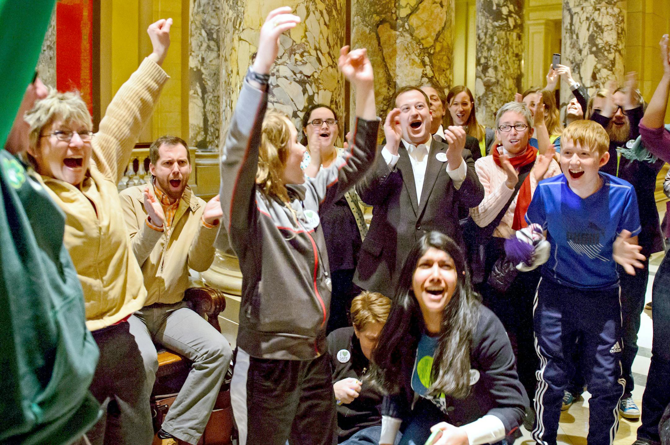 Members of Outfront Minnesota held their breath and prayed as the vote was taken on the anti-bullying bill and cheered as it passed 36-31. ] GLEN STUBBE * gstubbe@startribune.com Thursday, April 3, 2014. ORG XMIT: MIN1404031846270798