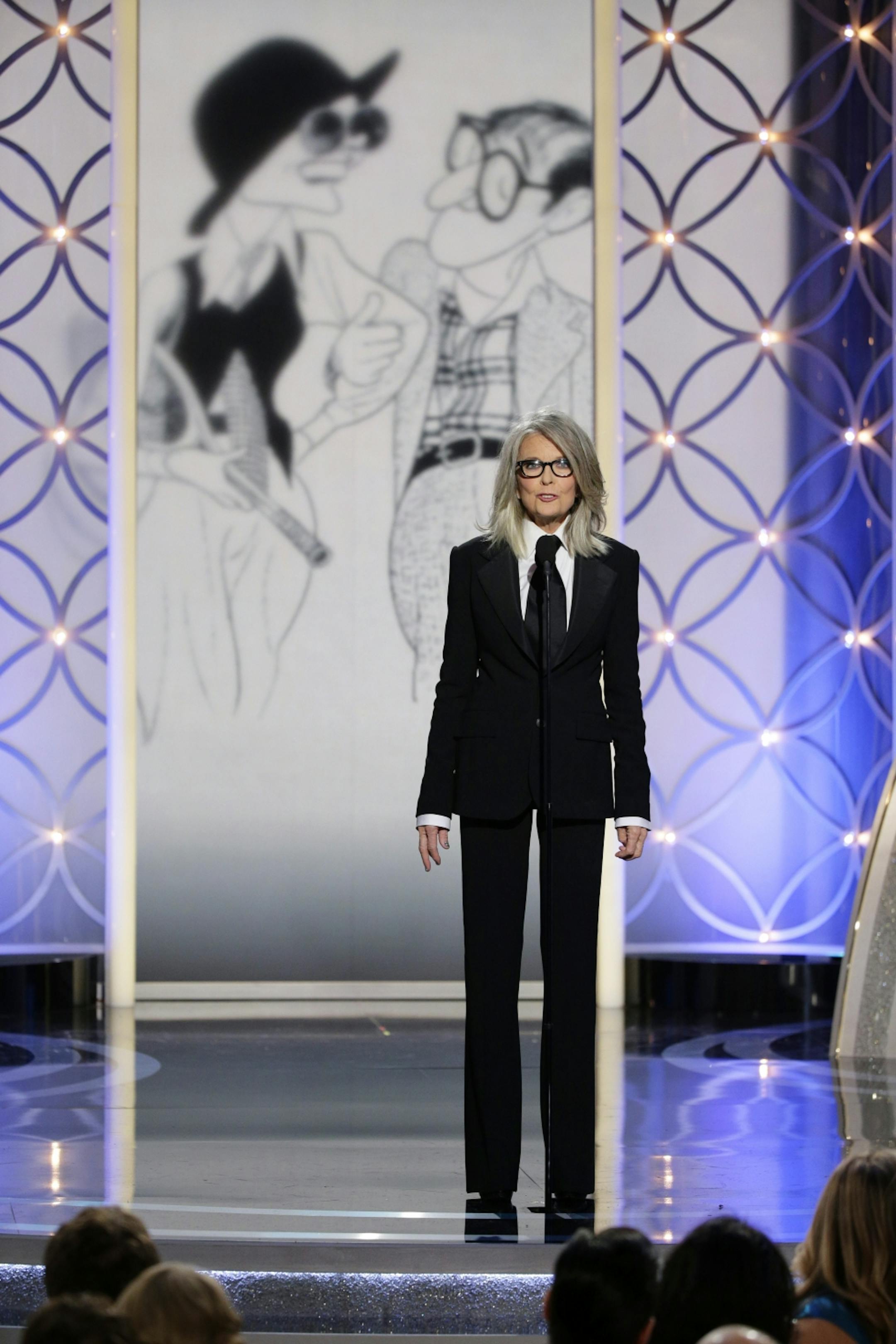 This image released by NBC shows Diane Keaton accepting the Cecil B. DeMille award on behalf of Woody Allen during the 71st annual Golden Globe Awards at the Beverly Hilton Hotel on Sunday, Jan. 12, 2014, in Beverly Hills, Calif.