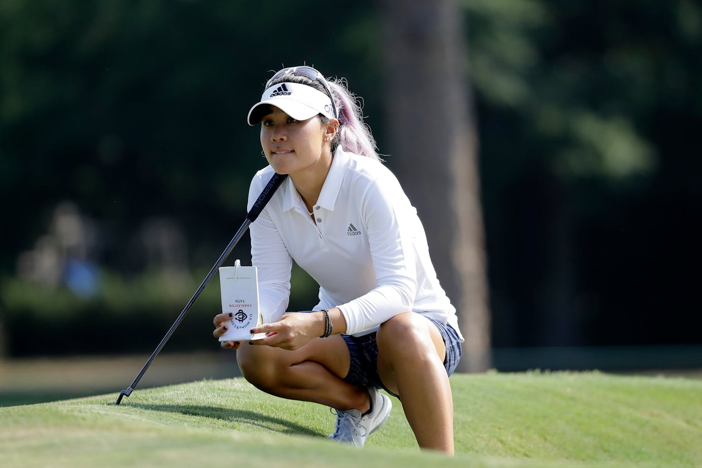 LPGA Tour player Danielle Kang is a woman of many interests. She earned a second-degree black belt in Taekwondo when she was 7, paints and draws, loves music, isn't allowed near a spatula and wants badly to own a hairy spider.