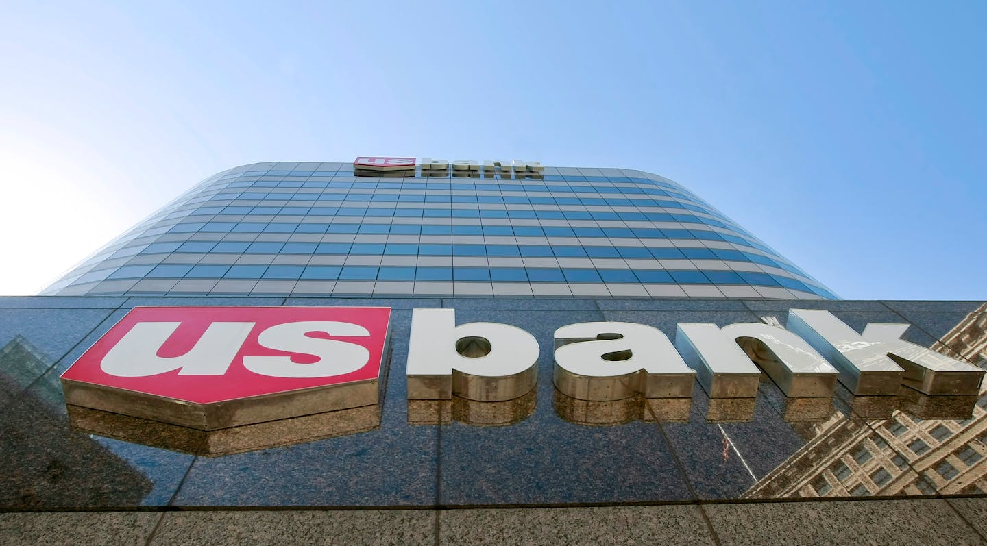 Signage is displayed on the exterior of the U.S. Bank building in Salt Lake City, Utah, U.S., on Monday, July 13, 2009. U.S. Bancorp, parent company of U.S. Bank, will report second quarter results on July 22. Photographer: George Frey/Bloomberg